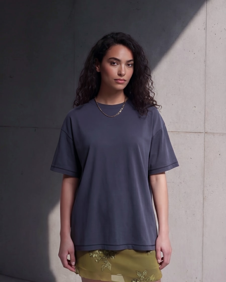 365.APParel Basic T-shirt Graphite — woman, full body front, neutral expression, concrete wall, outdoor