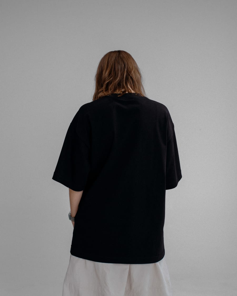 365.APParel Oversize T-shirt Black — woman, cropped back view, studio