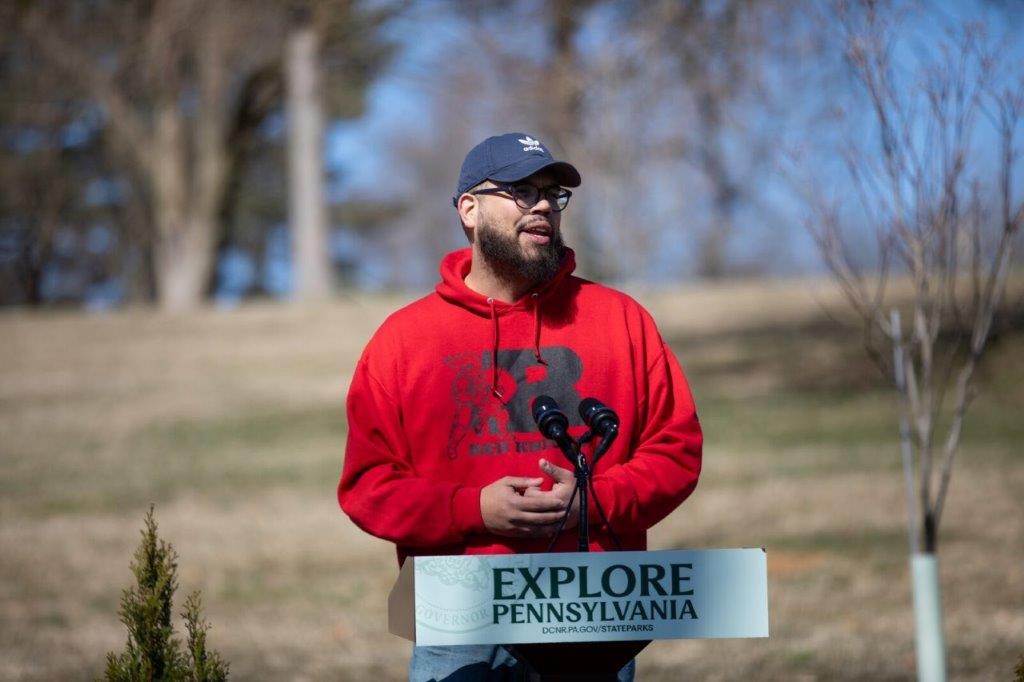 Manny Guzman speaking at outdoor environment event in Reading PA