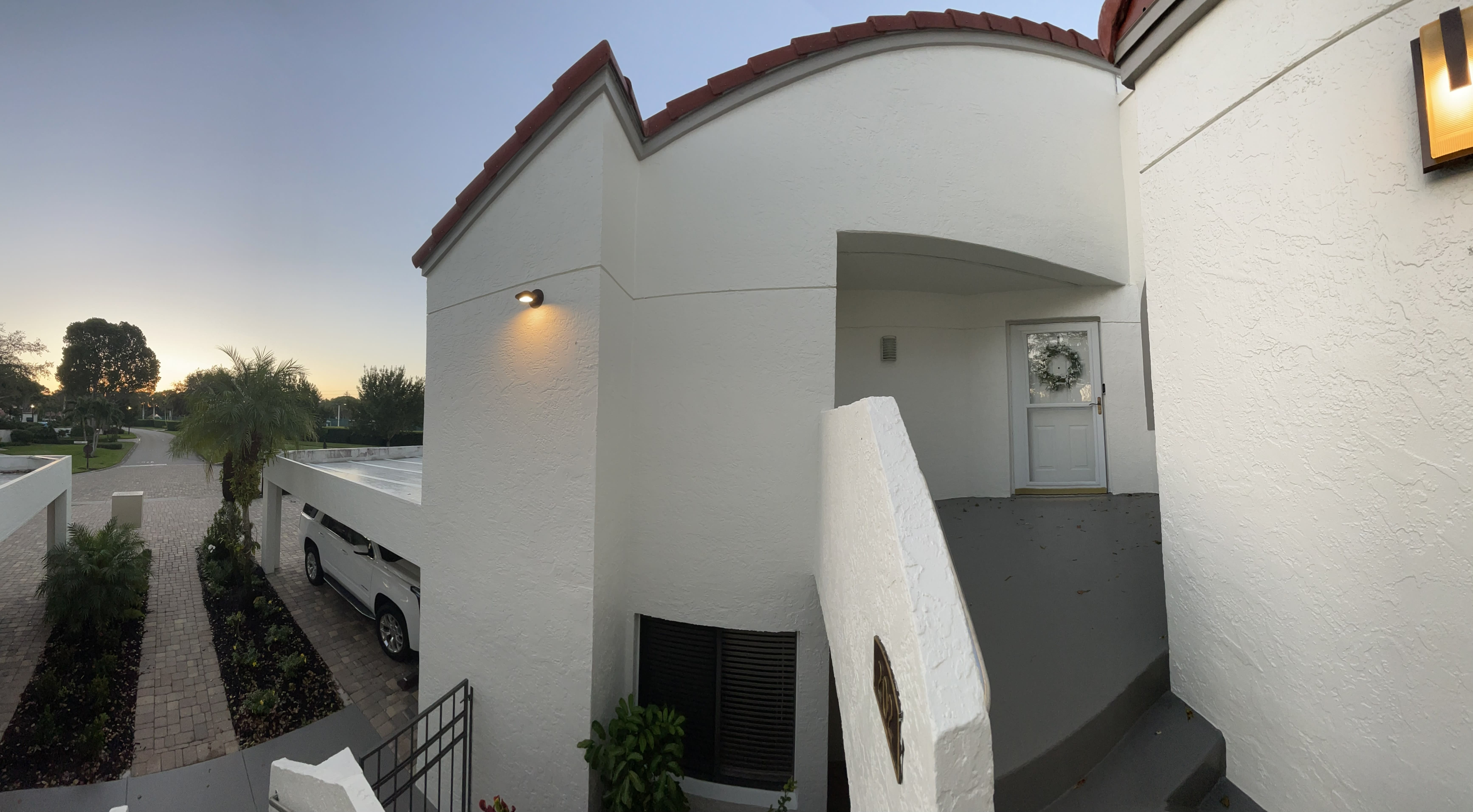 Entrance and tennis court view