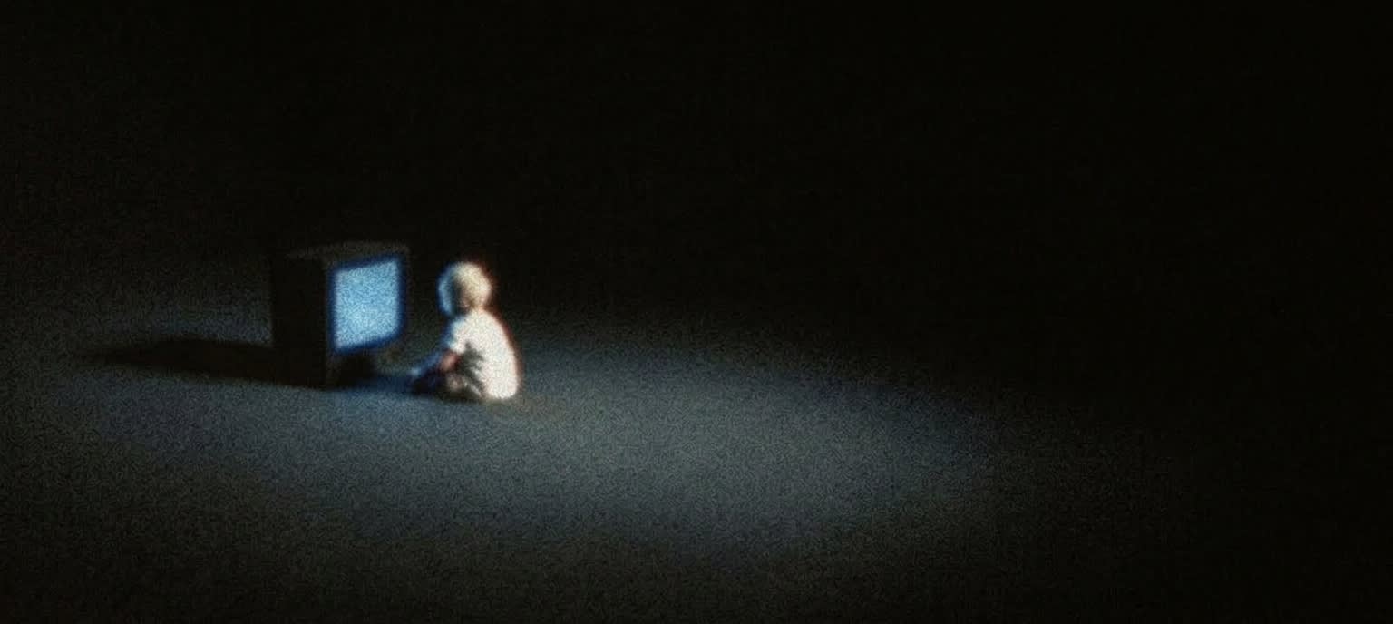 A child watching TV static
