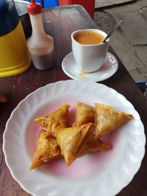 Morning breakfast with samosa and tea Morning breakfast with samosa and tea