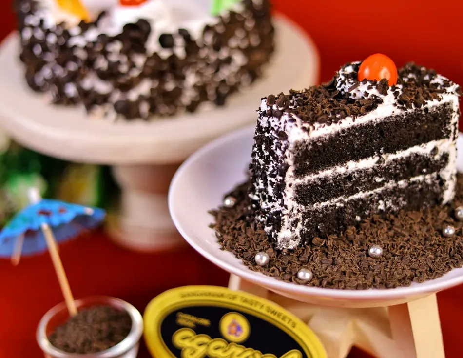 Chocolate and cream cakes on display