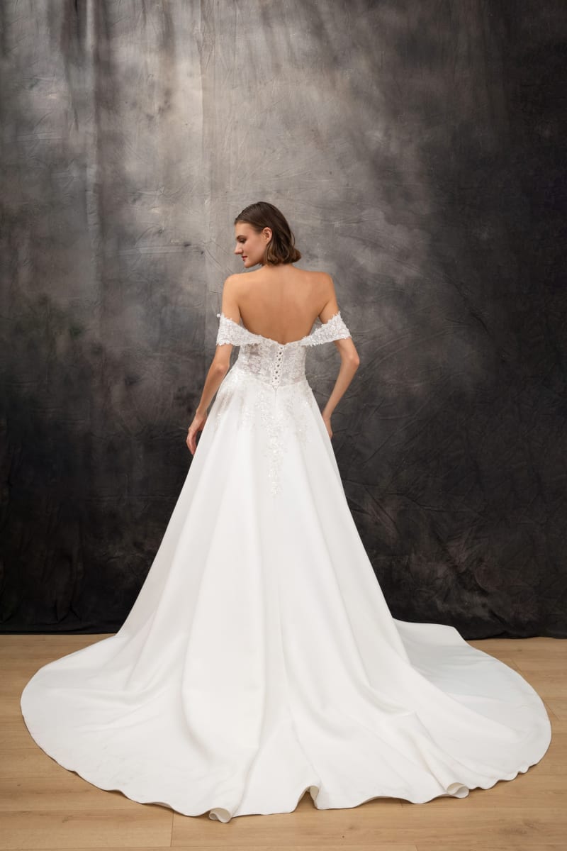 Clorina — robe de mariée bustier cœur manches tombantes broderies perlées