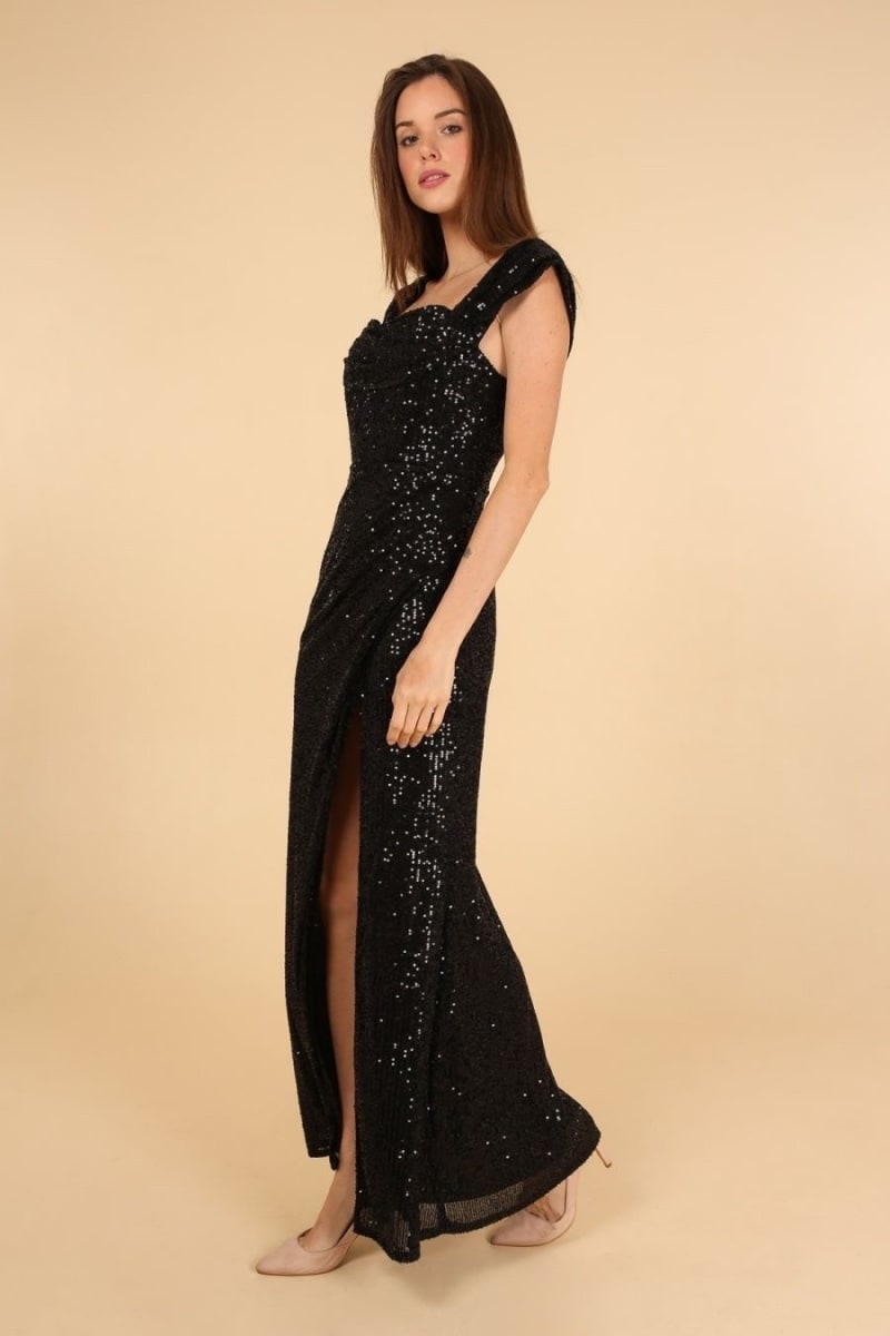 Ezia — robe longue sequins décolleté bateau plissé taille jupe fendue