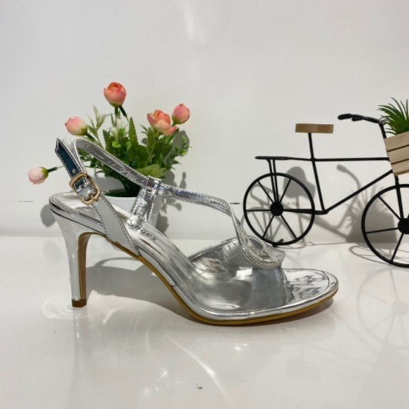 Céline — sandales bride talon fin 8 cm effet transparence et miroir argenté
