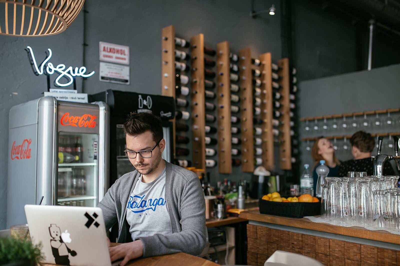 An X-Teamer working from a coffee shop