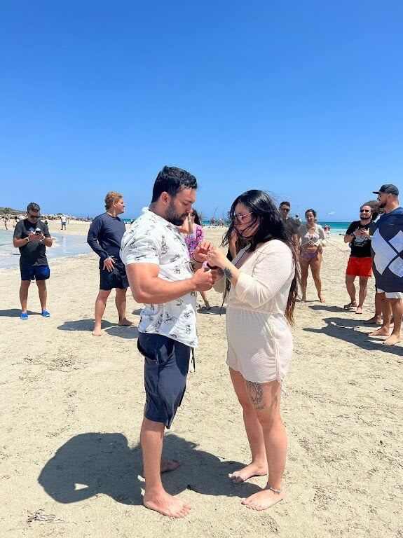 A couple getting married on the beach