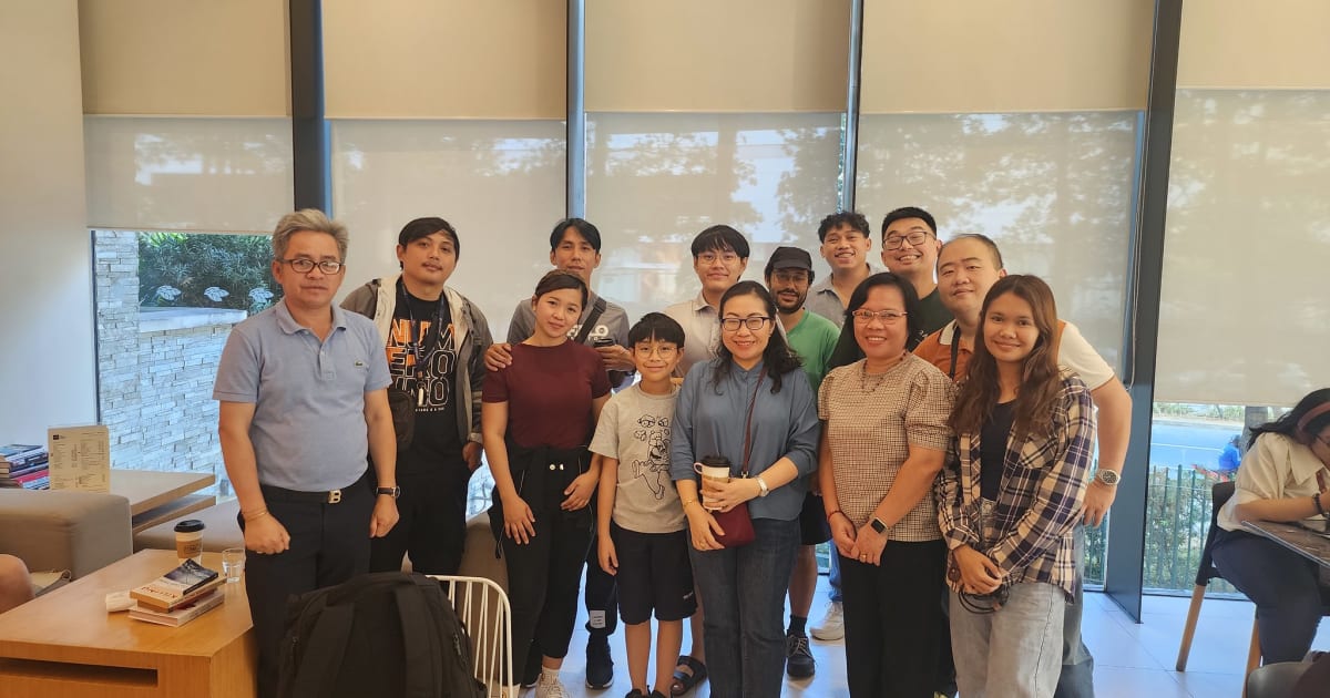 GoPinas BGC meetup — players around a Go board