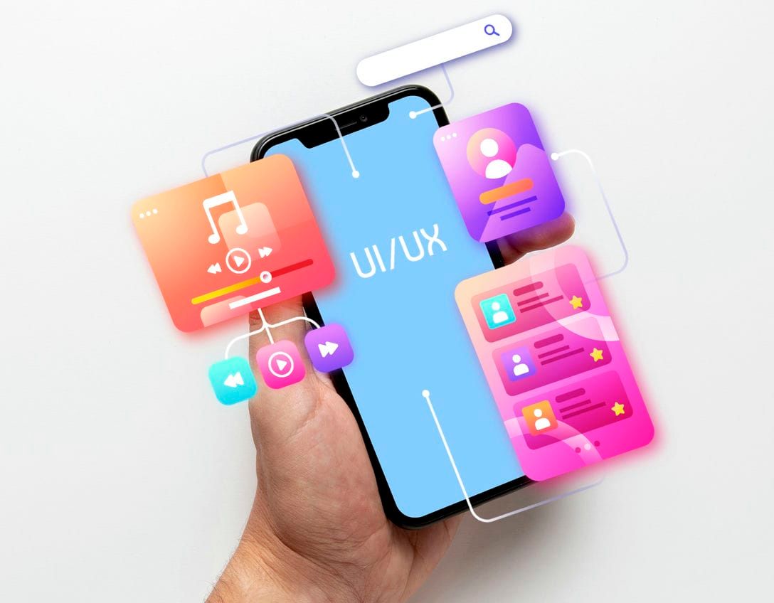 A hand holding a smartphone displays colorful UI/UX design icons, emphasizing mobile interface innovation.