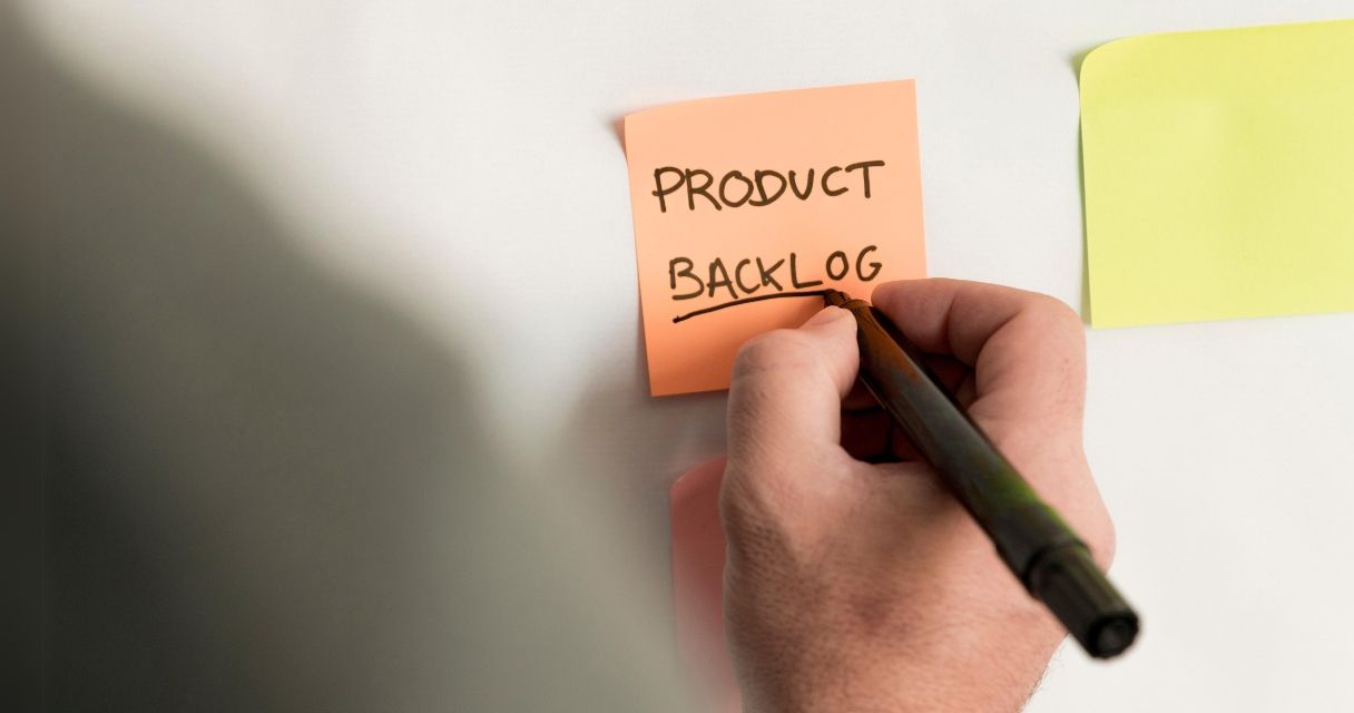 Close-up sticky note with product backlog