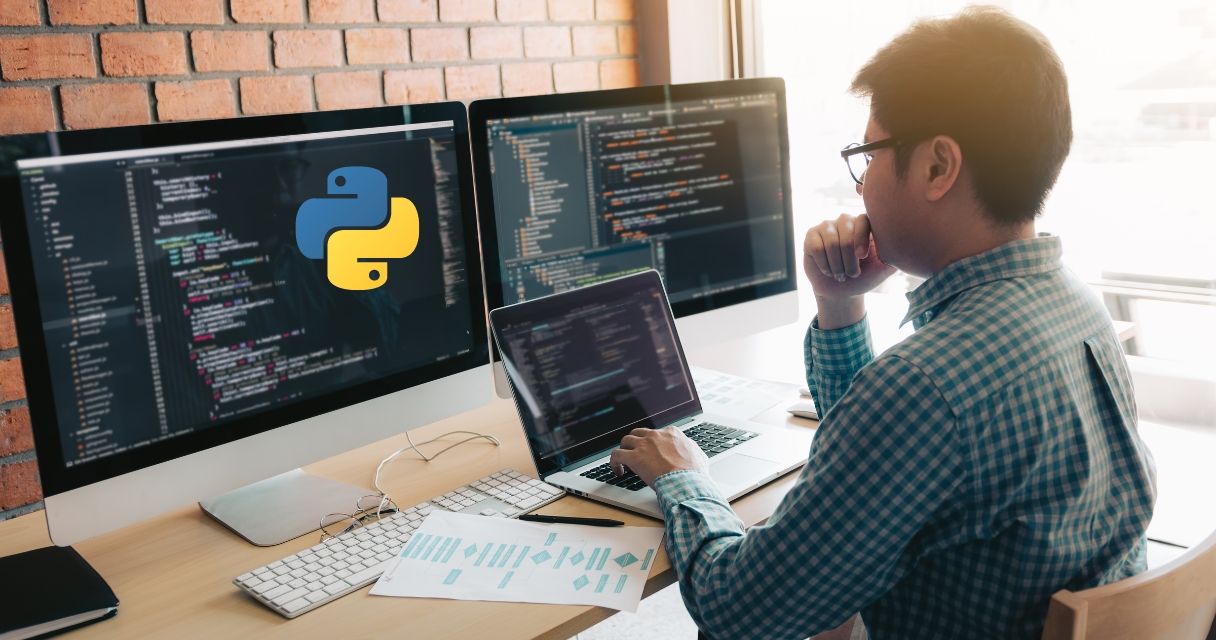 Person in front of computer working coding
