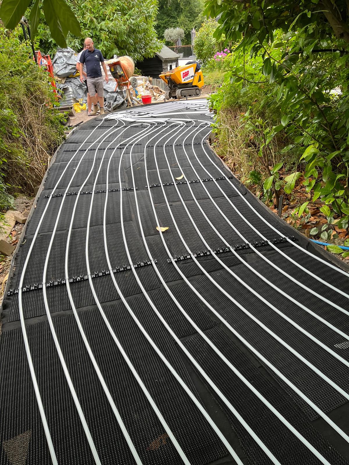 Surface thermal array installation showing shallow collector pipes