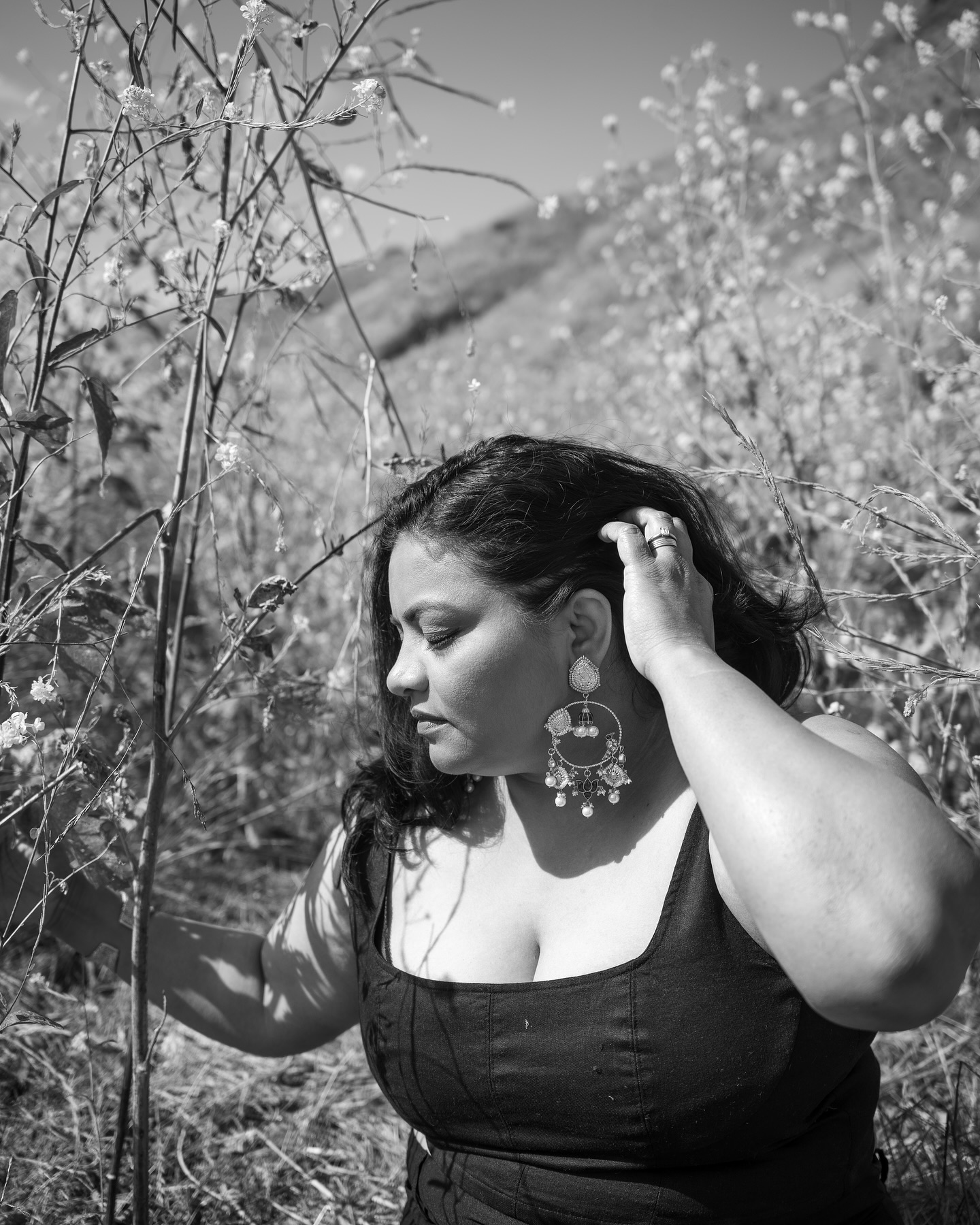 Model wearing elegant handcrafted 925 silver jewelry from Theeya
