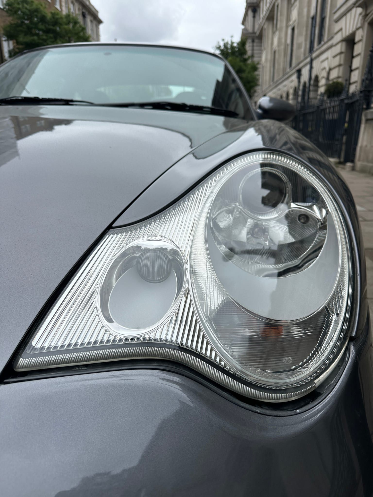Headlight after Platinum restoration and PPF installation — crystal clear with film protection