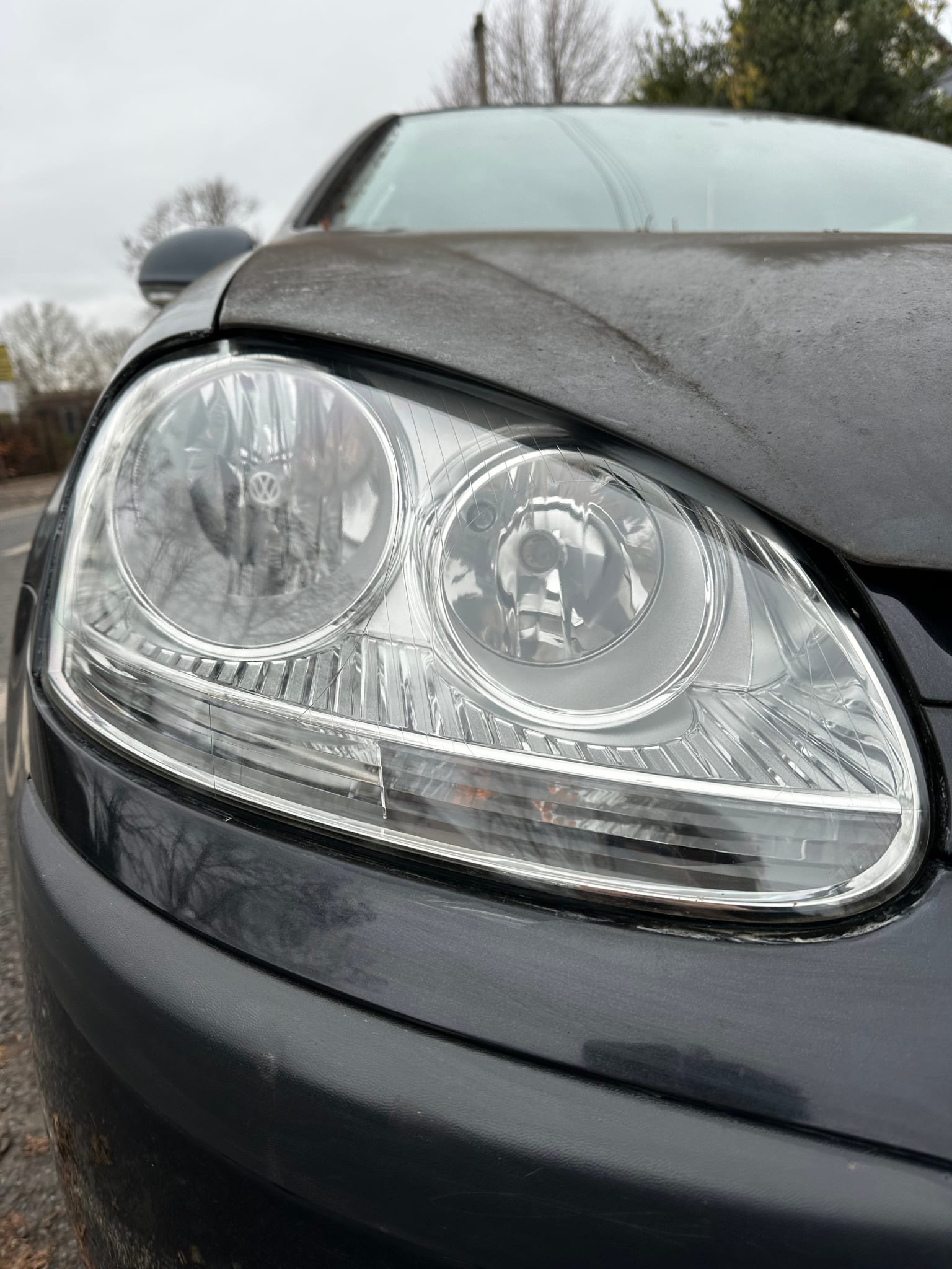 Headlight before Silver restoration — oxidised and yellow