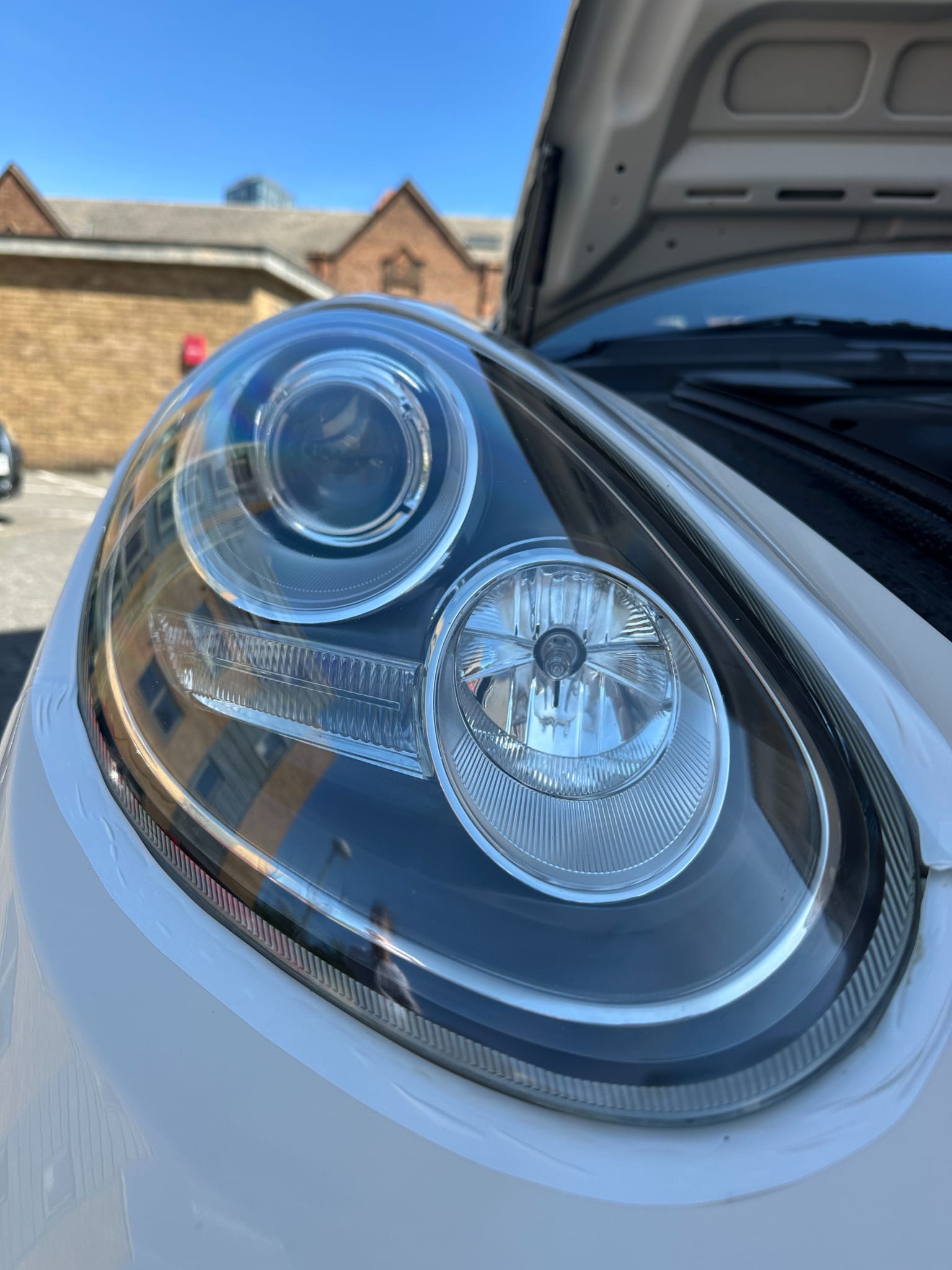 Porsche Boxster headlight after restoration