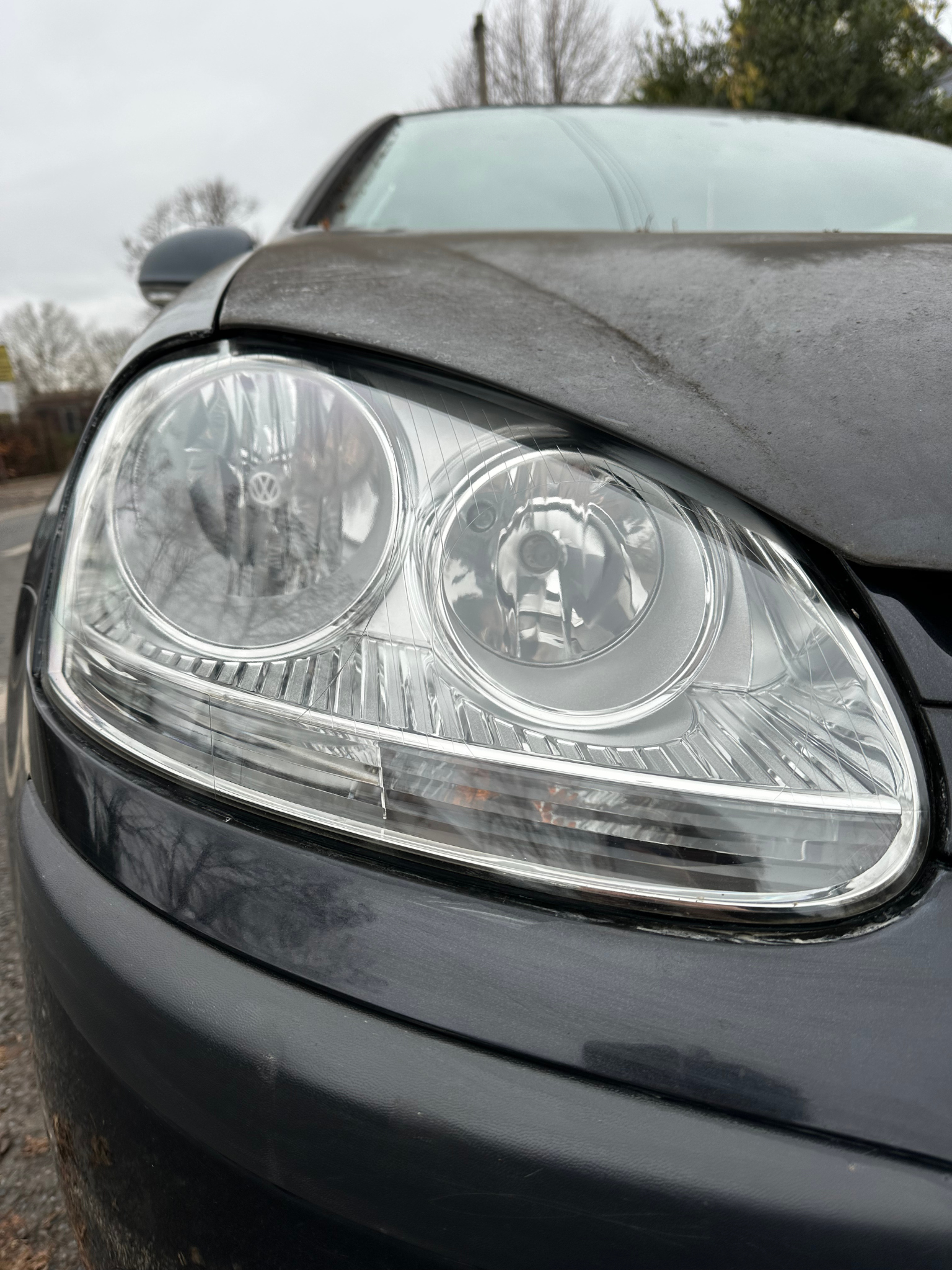 Headlight before Silver restoration — oxidised and yellow