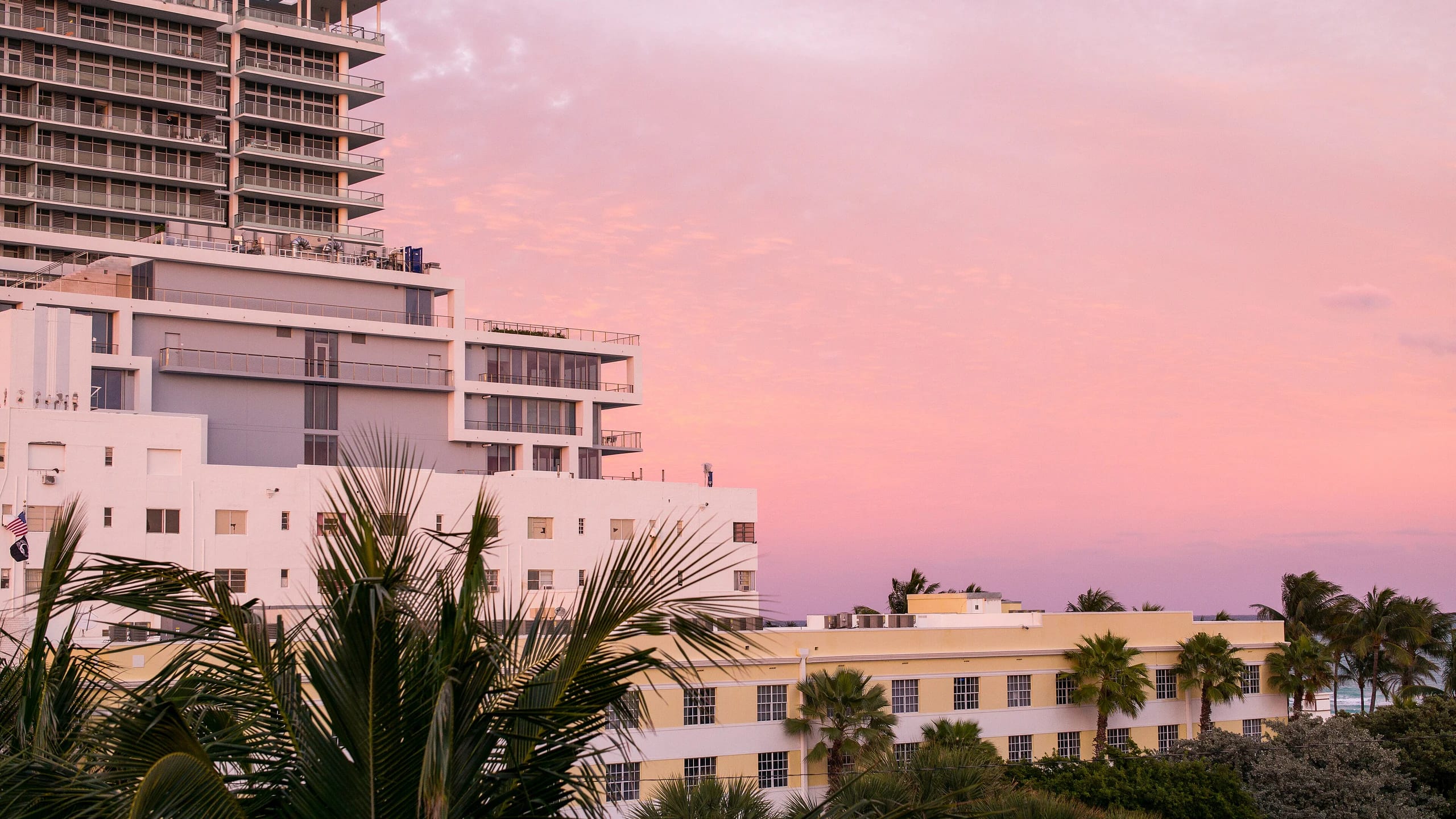 Miami Beach under a pink sunset sky