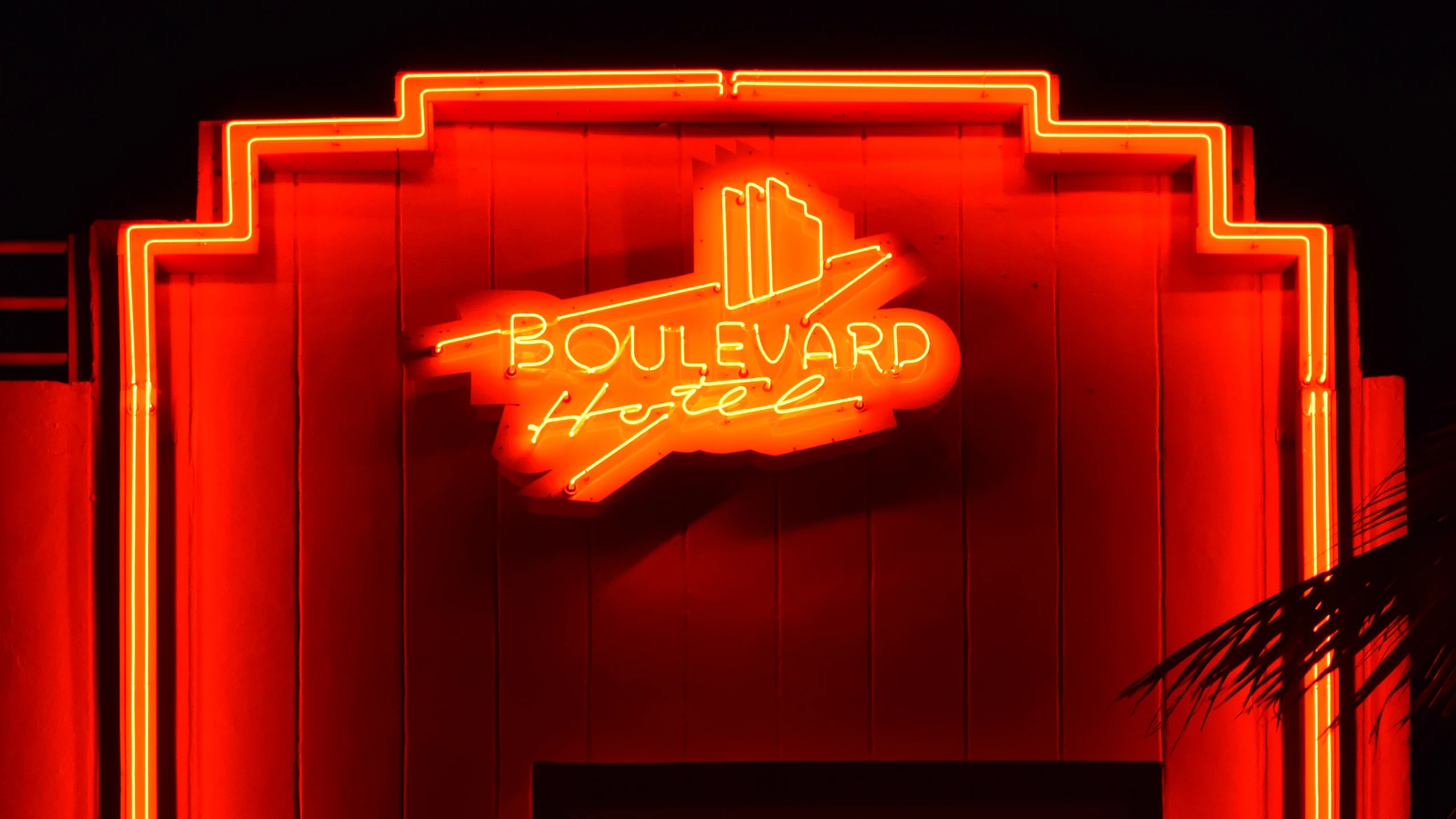 The red neon sign of the Boulevard Hotel