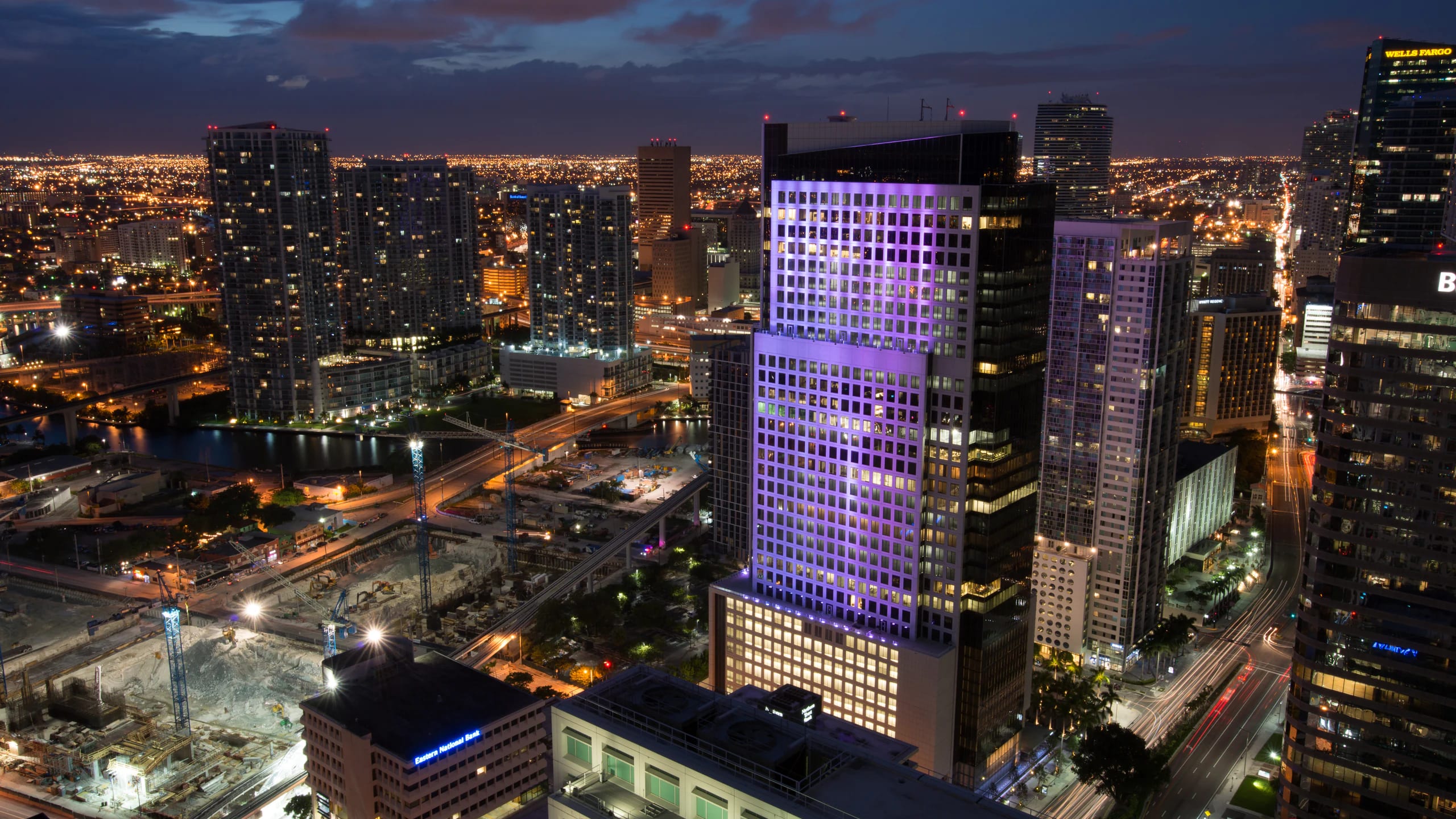 Brickell's towers lit up at night