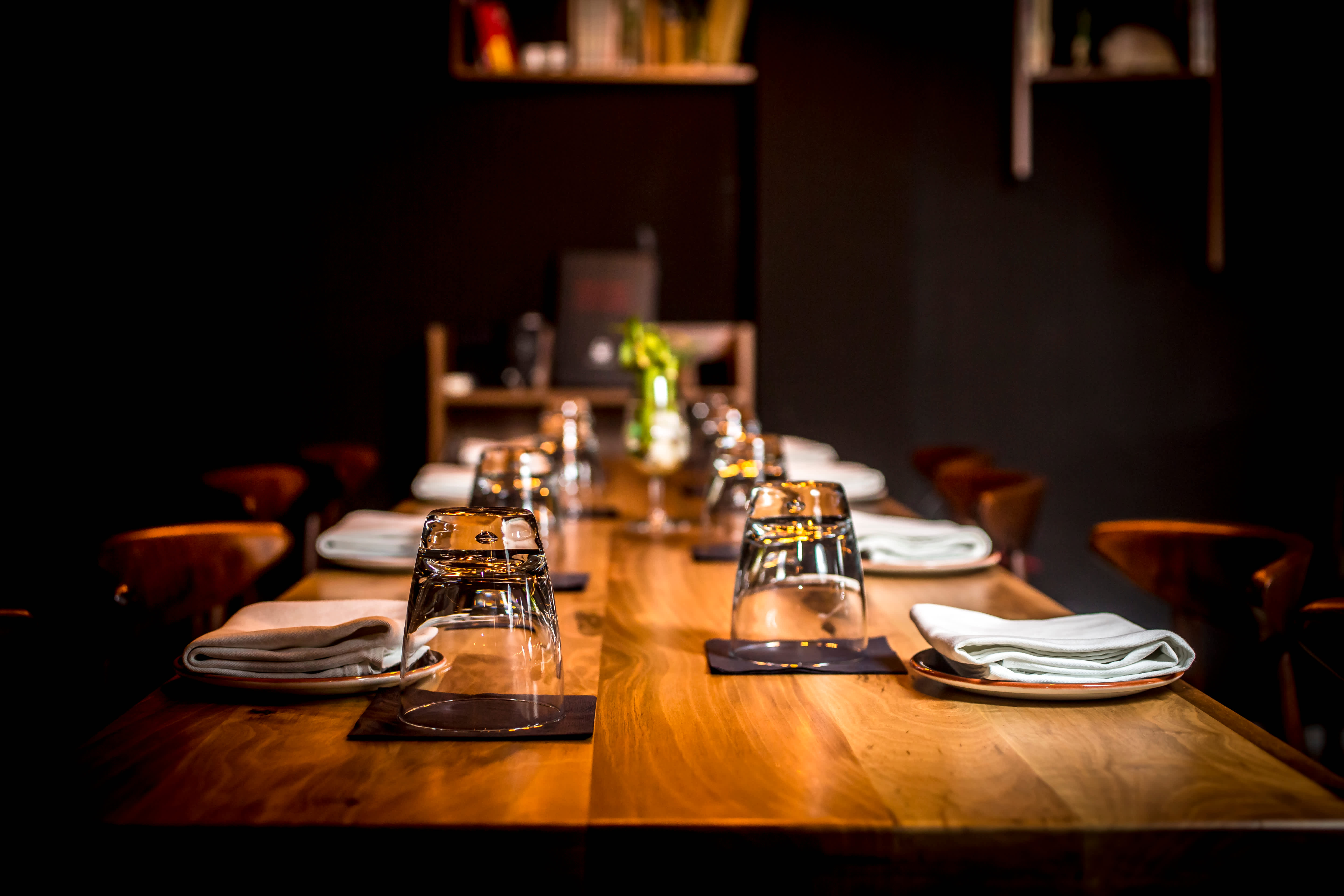 The Jeonju Halmae dining room — dark warm wood tables where the recipes have been served since 1972