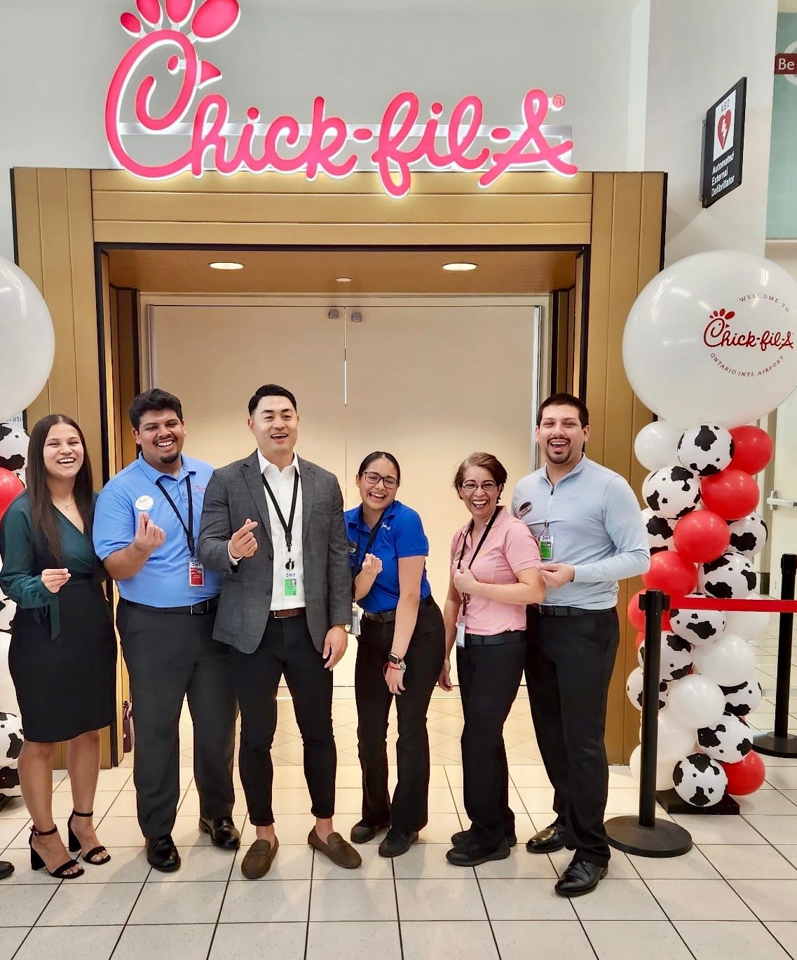 Andrew Yoo and Chick-fil-A team at ONT grand opening