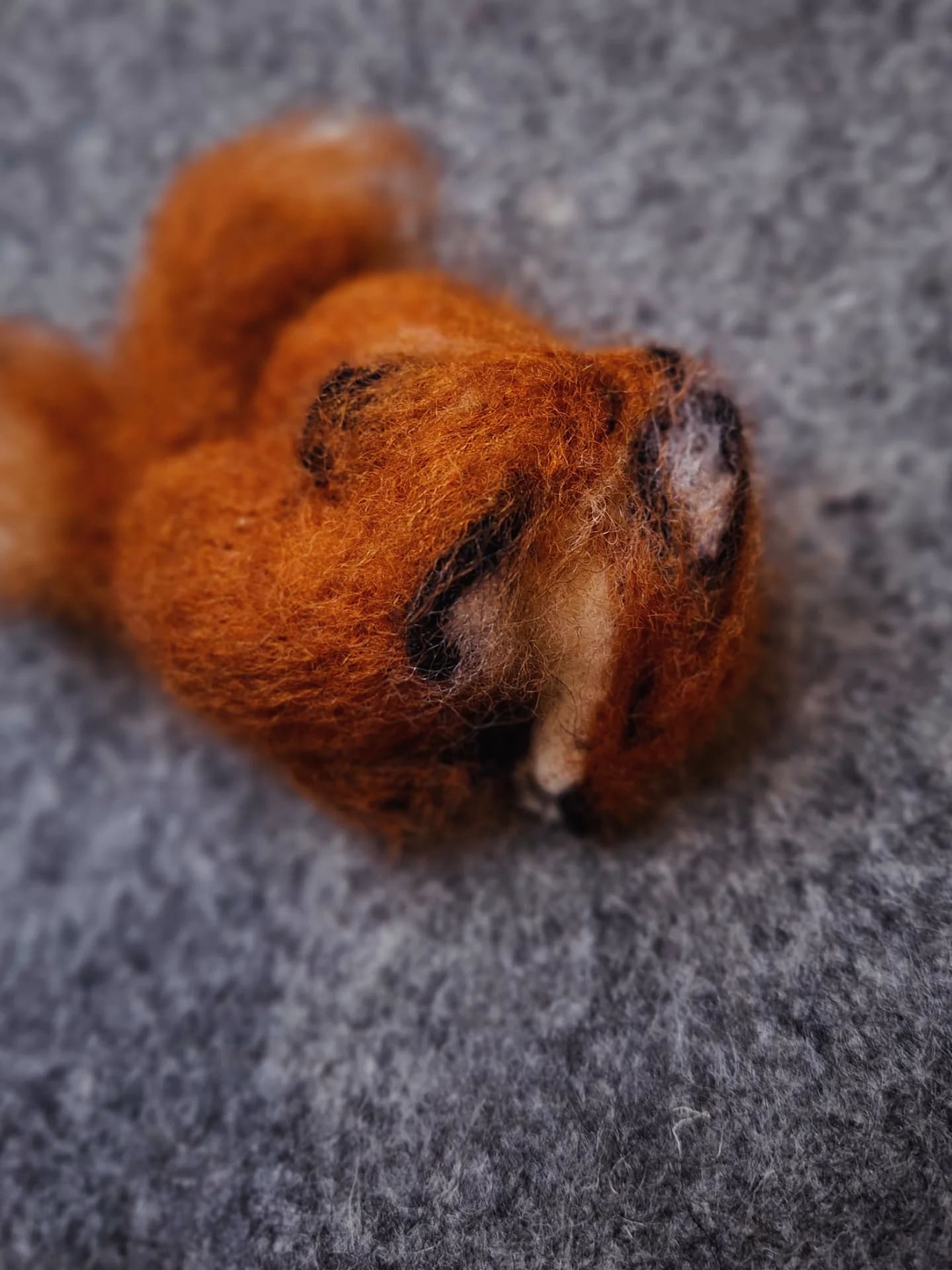 Needle felted cosy foxes brooch