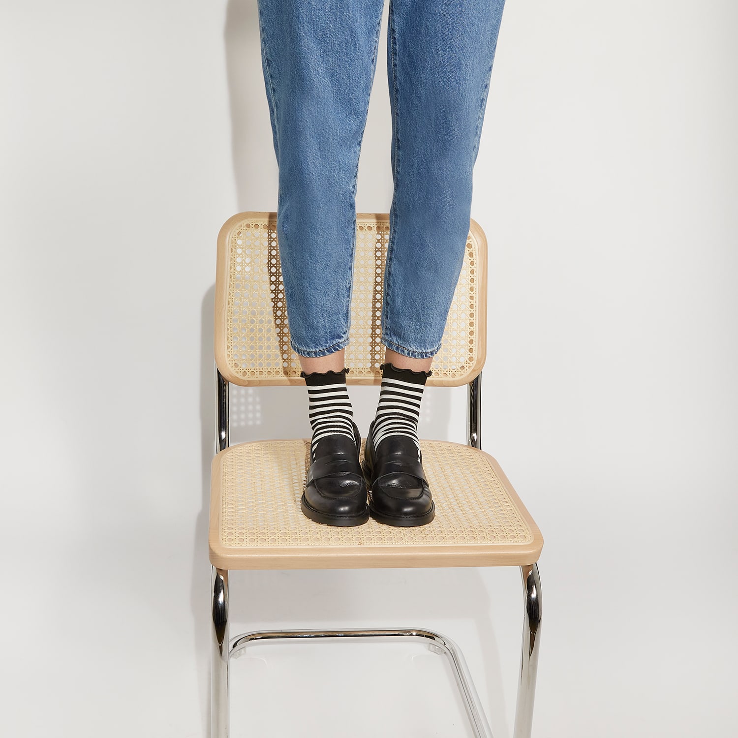 Model wearing our Geeno loafers in black