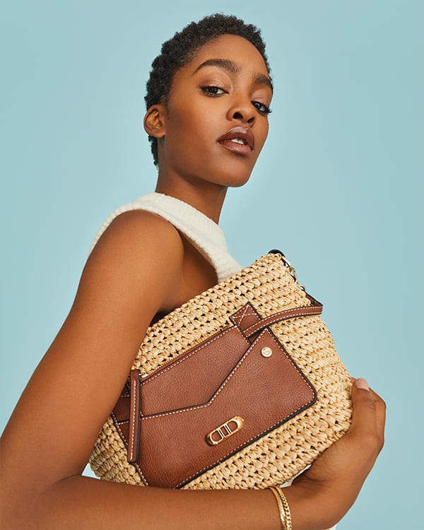 Model with the Davenporte bag tucked under her arm