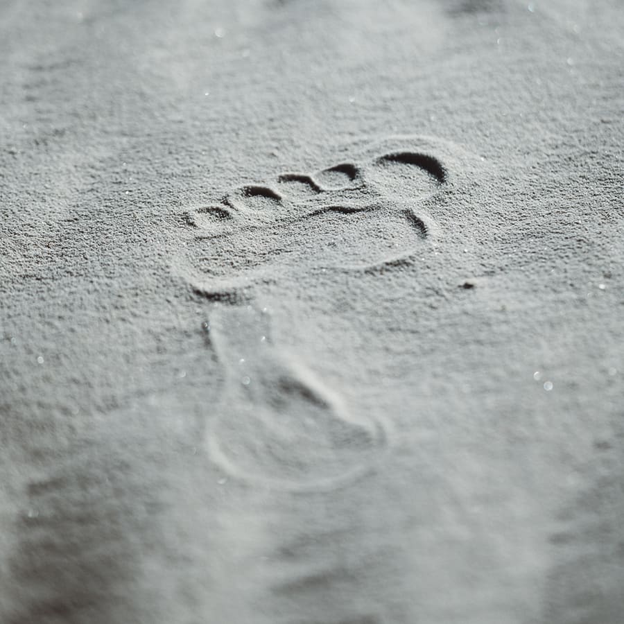 Image of foot step in sand