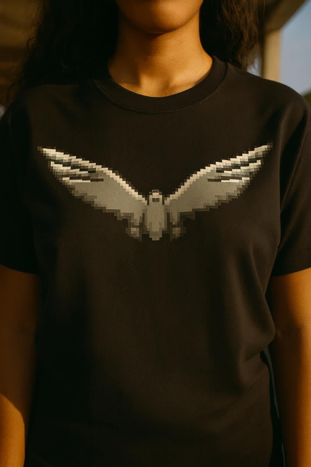 TRUST worn on the classic tee, detail view