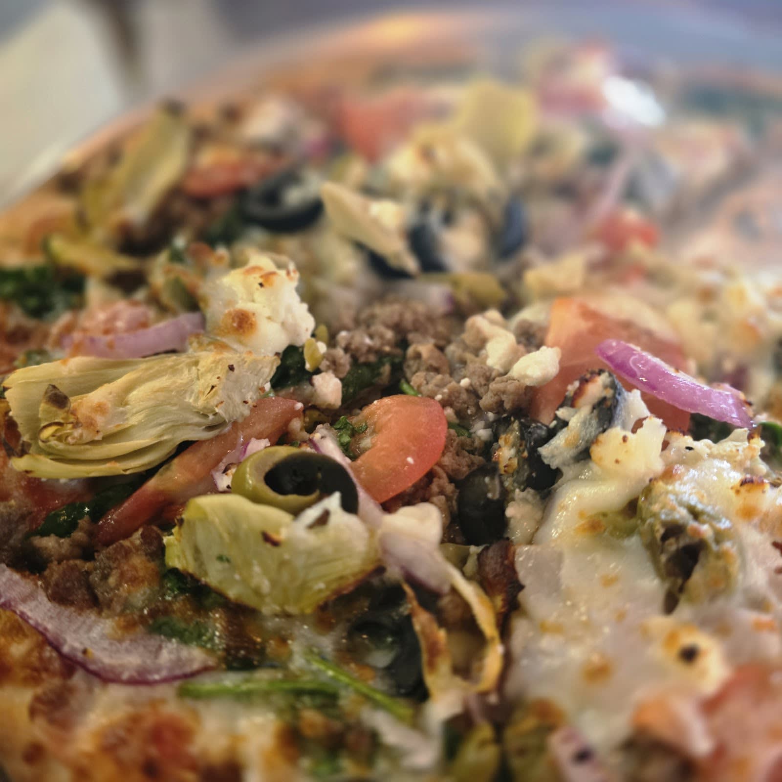 Table set with food at Crust Pizza Co. in The Woodlands