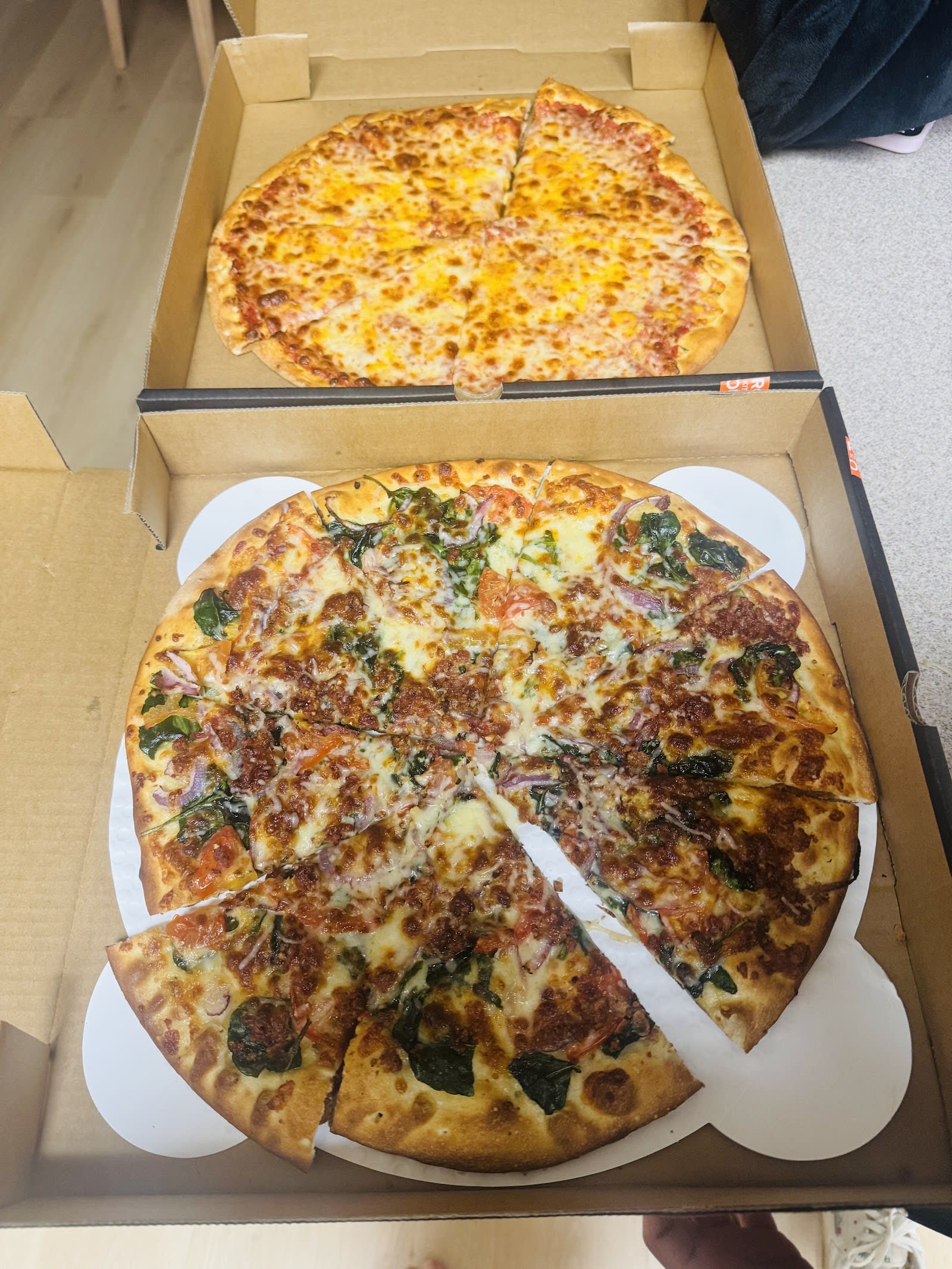 Pizza on the counter at Crust Pizza Co. Alden Bridge, The Woodlands
