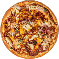 Close-up of a slice of pizza at Crust Pizza Co. in The Woodlands, TX