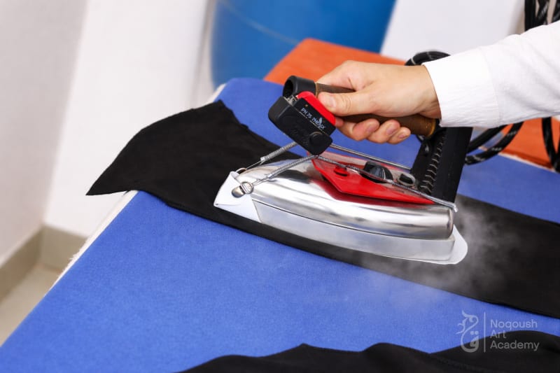 Garment pressing technique - Noqoush Academy finishing skills