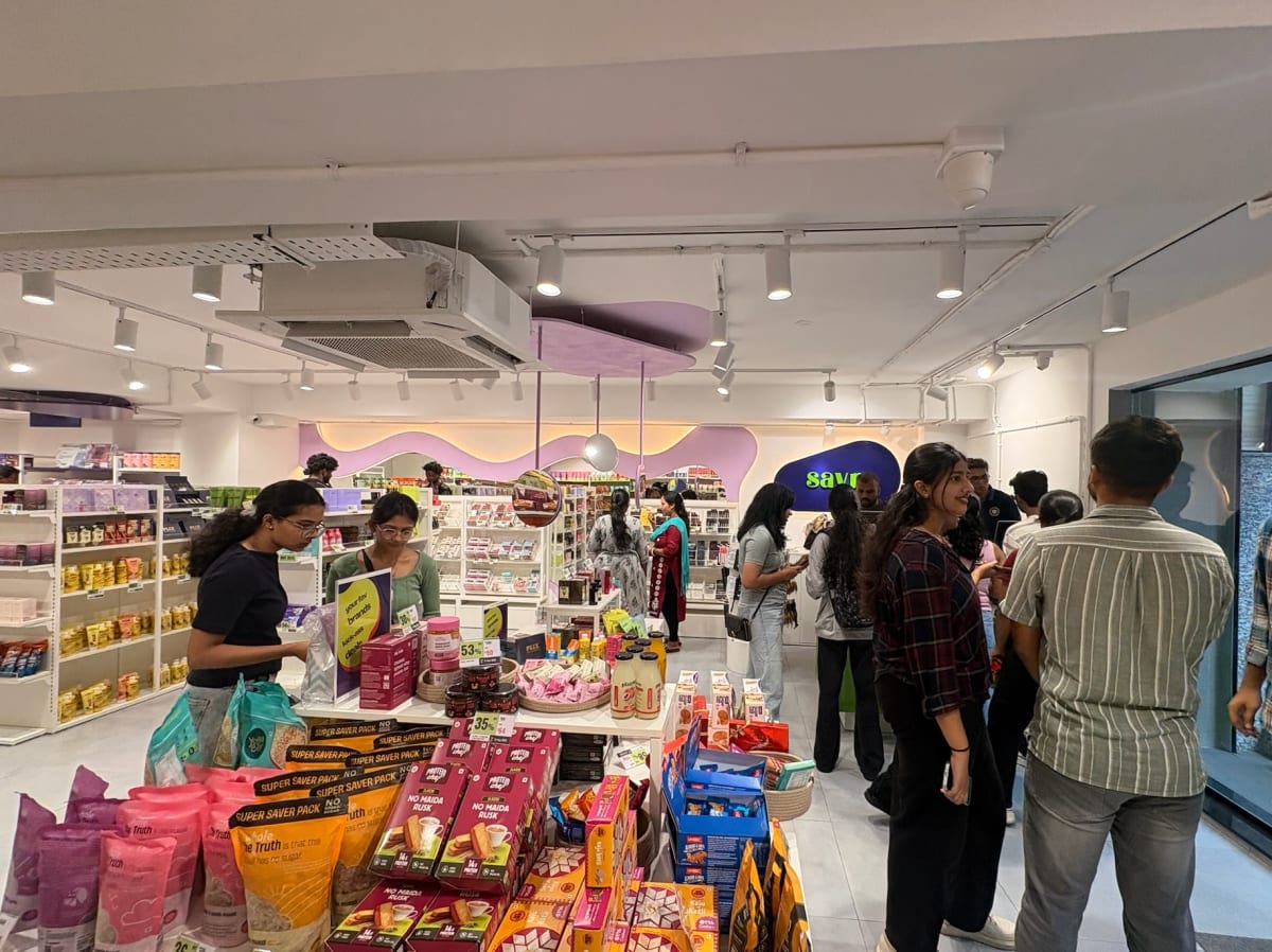 Shoppers browsing the shelves at the Savr store