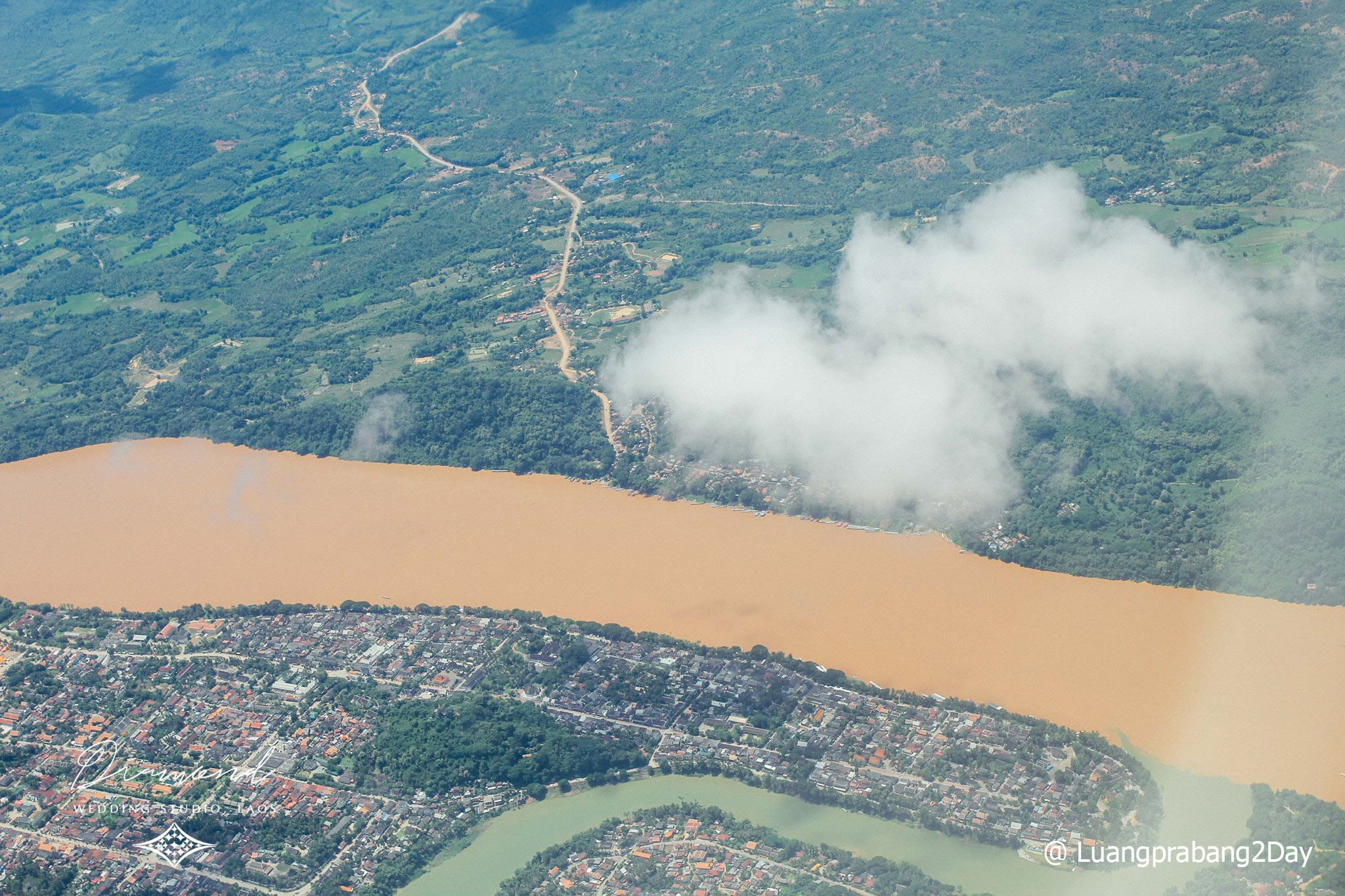 Aerial view of Luang Prabang city and Mekong River highlighting tourism growth linked to the planned modernisation of Luang Prabang International Airport in Laos. Aerial view of Luang Prabang city and Mekong River highlighting tourism growth linked to the planned modernisation of Luang Prabang International Airport in Laos.