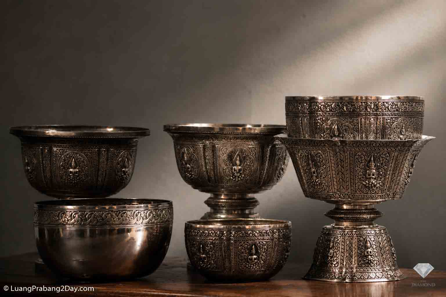 A collection of handmade ceremonial silverware produced by the descendants of Luang Prabang's former Royal Palace silversmiths. A collection of handmade ceremonial silverware produced by the descendants of Luang Prabang's former Royal Palace silversmiths.
