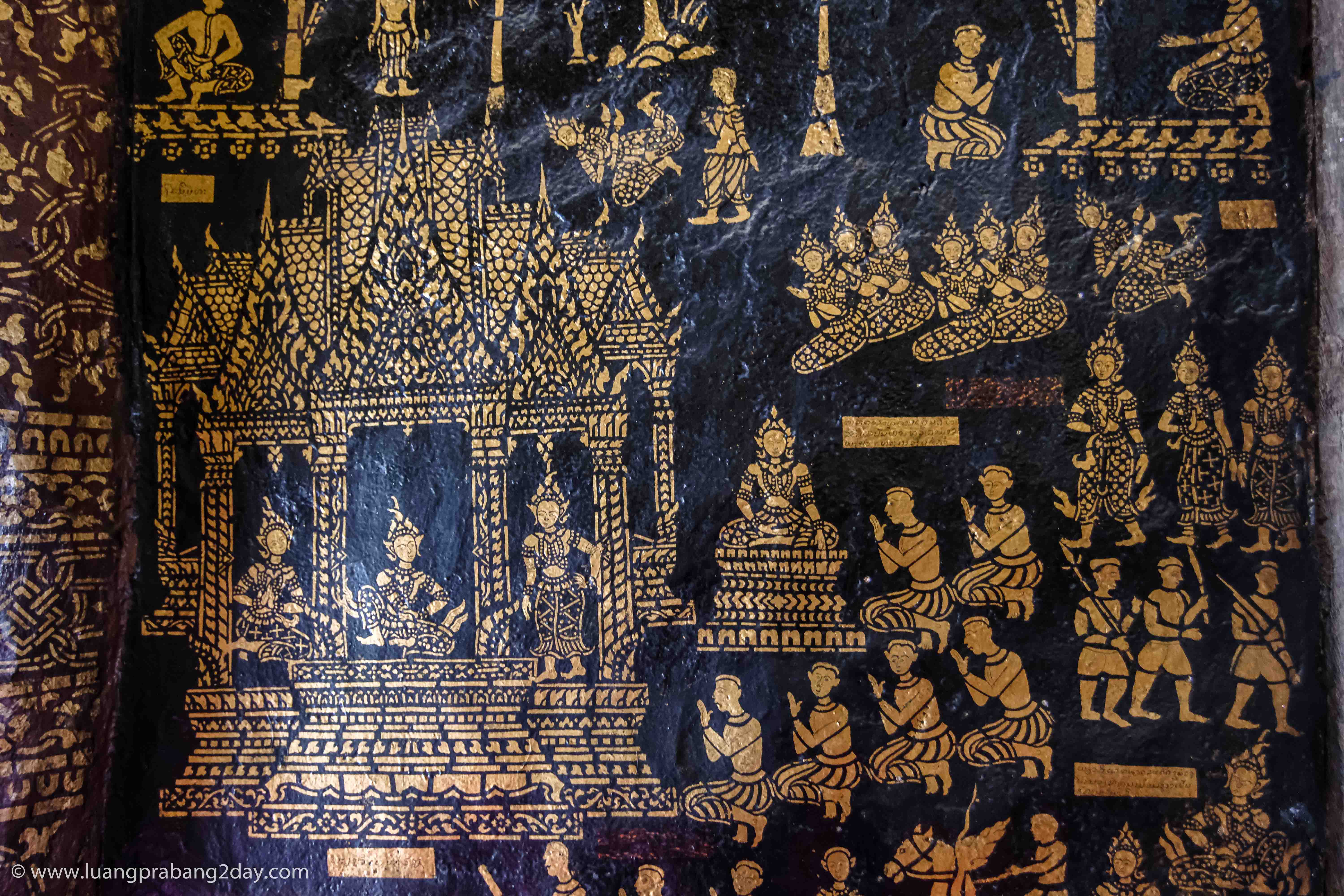 Narrative gilded relief illustrating Buddhist stories on the interior wall of Wat Xieng Thong. Narrative gilded relief illustrating Buddhist stories on the interior wall of Wat Xieng Thong.