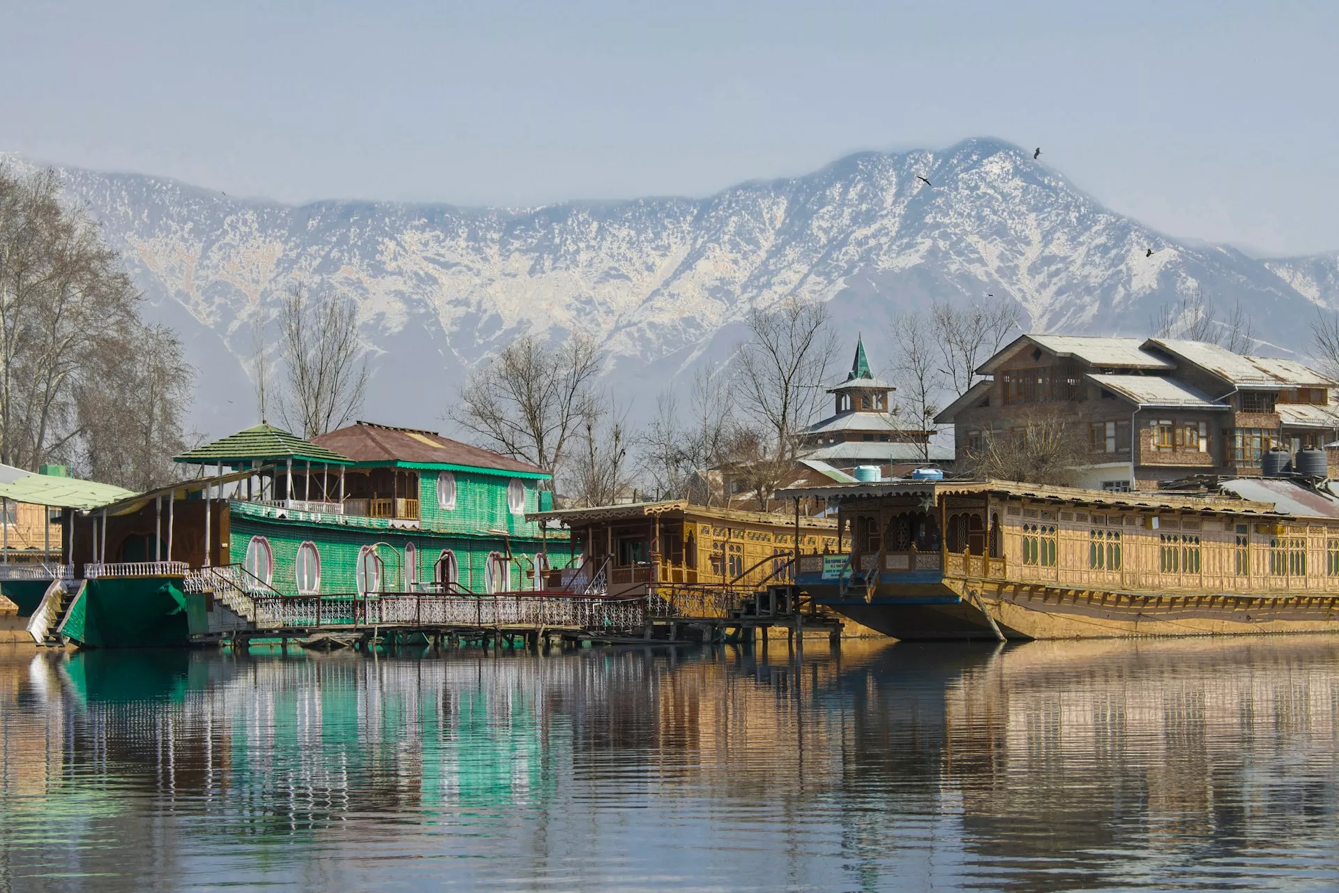 Peaceful Pahalgam river view with a boat