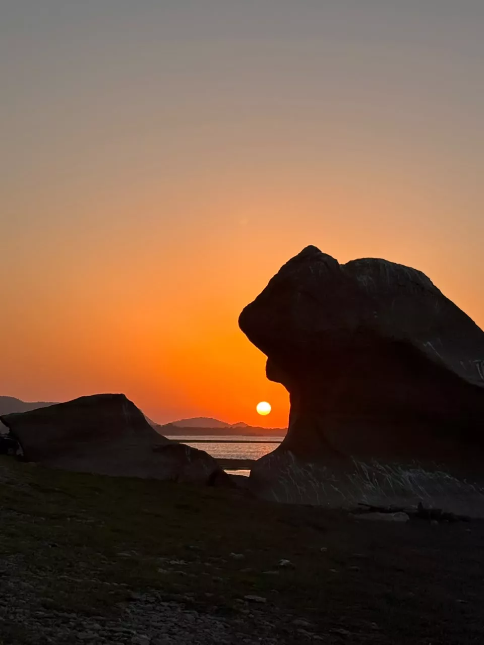 Jawai Dam at sunset with tea