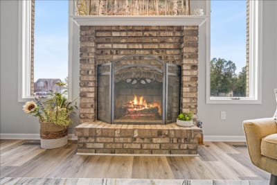 Brick gas fireplace at 147 Cranbrook Drive Howell MI