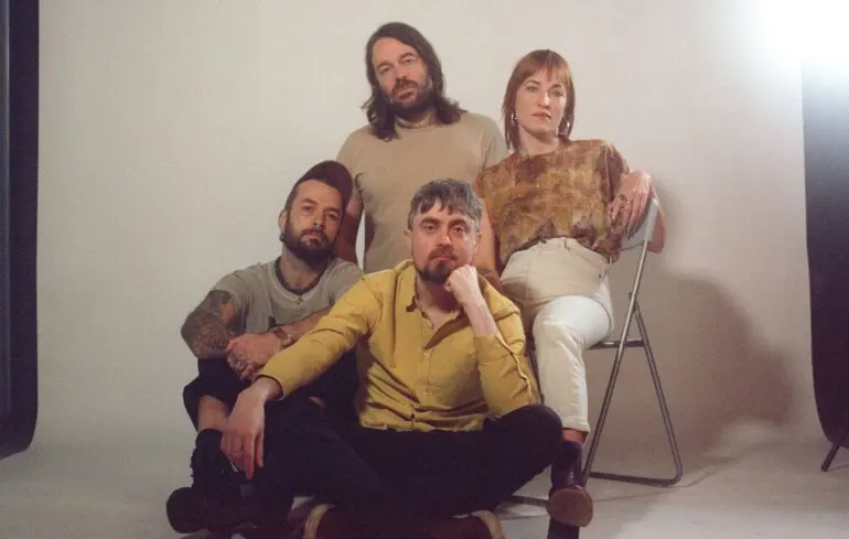 Stylized promotional image of Lankum and Sorcha Frances Ryder in artistic setting