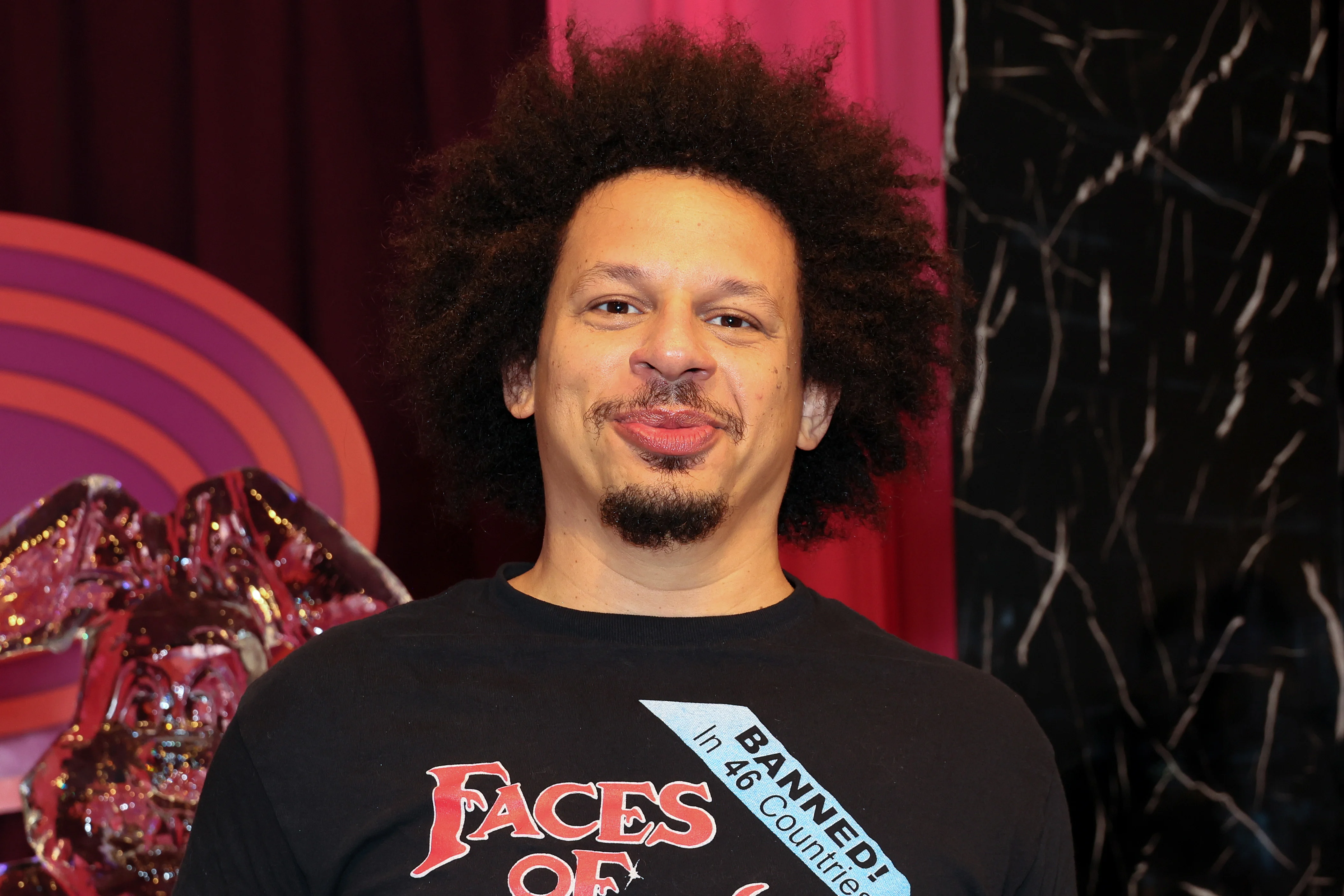 Tame Impala frontman Kevin Parker on stage under vibrant lighting, emphasizing the band's psychedelic sound.