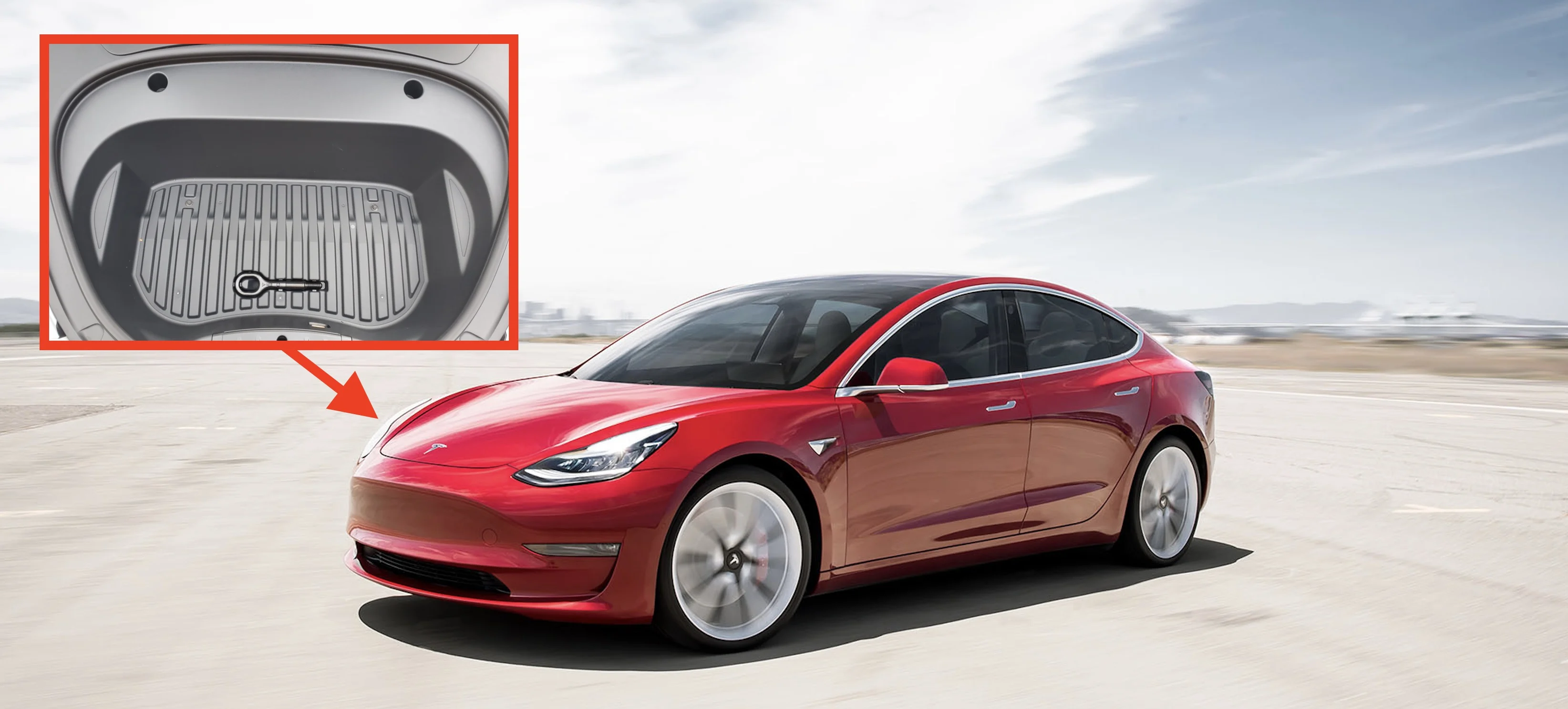Photo of Tesla Model 3 demonstrating the updated front trunk (frunk) design with an open hood perspective.