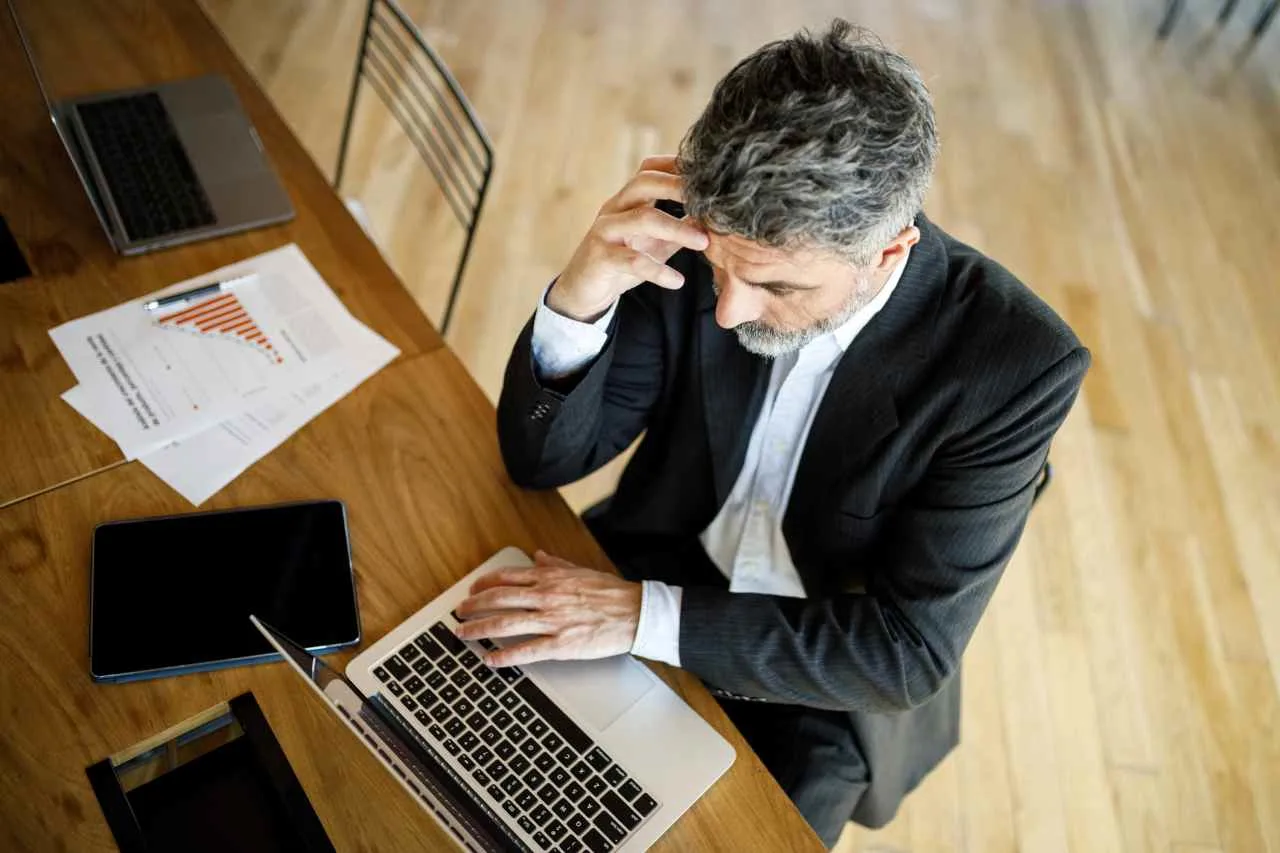 Clear and professional image of a Social Security card and money, illustrating the topic directly.
