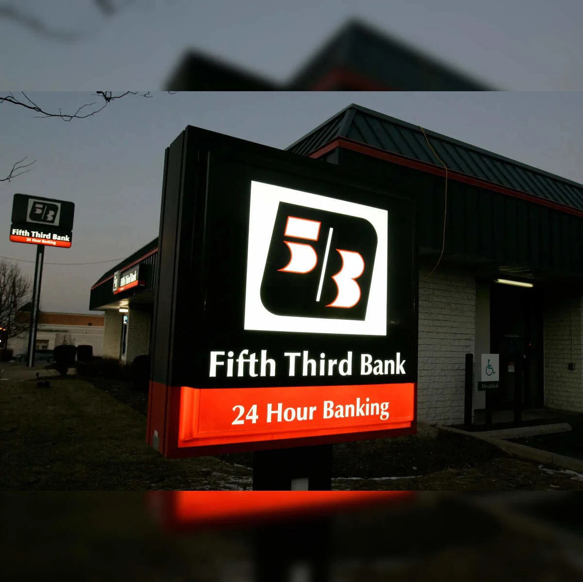 High-quality image showing branding elements of both Fifth Third and Comerica, representing the merger and scale of the $10.9B deal.
