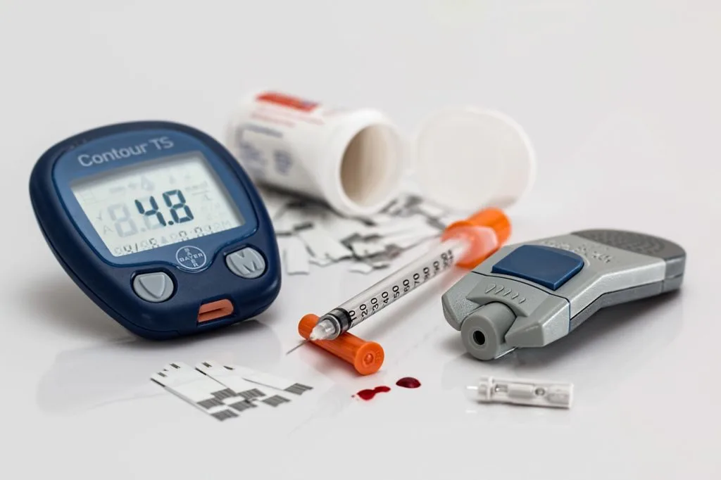 Doctor holding patient’s hand while measuring blood sugar level in clinical setting, depicting healthcare approach to managing prediabetes.