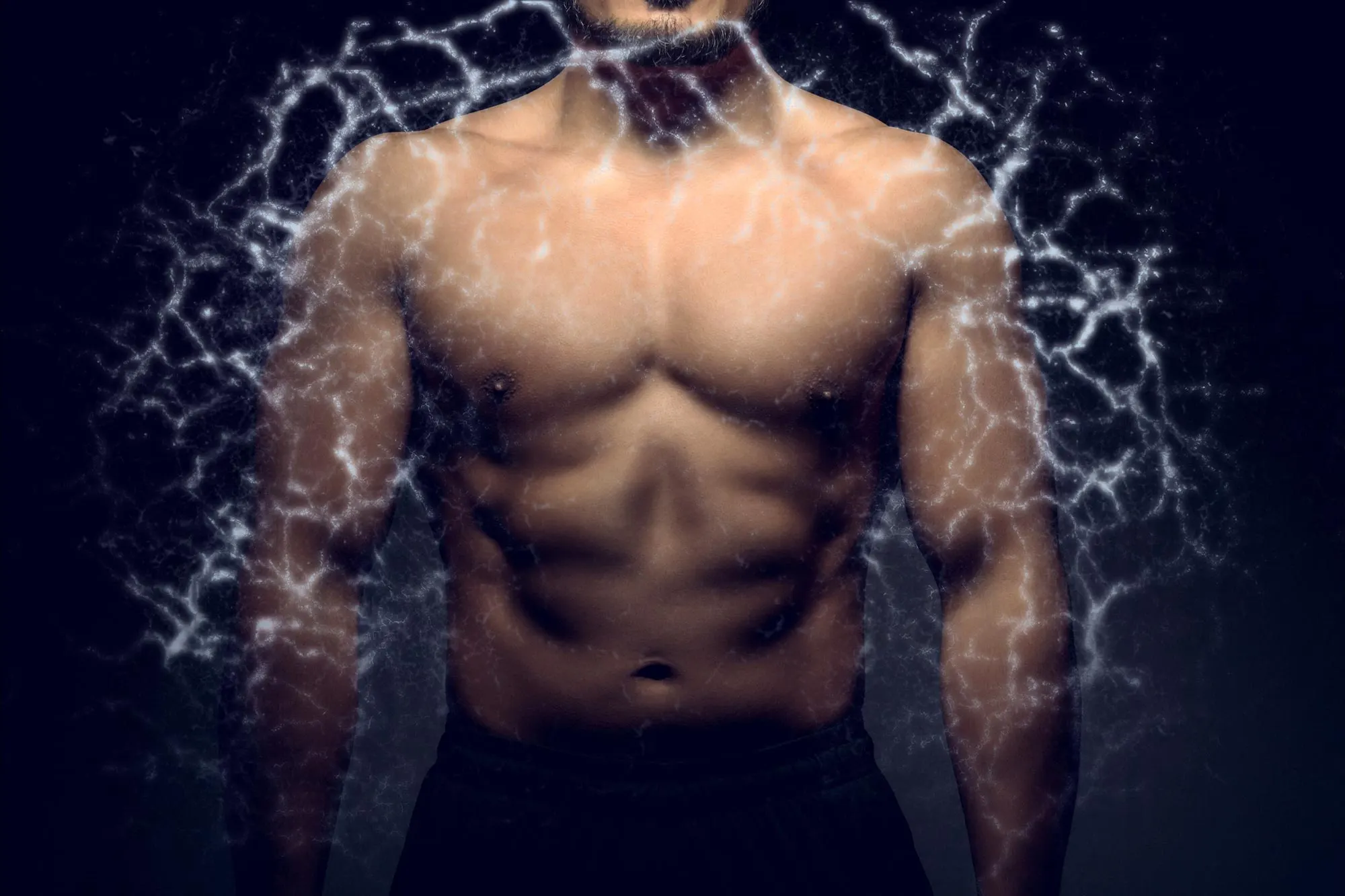 A fit man with a muscular upper body post-workout, representing strength and energy gained from protein consumption.